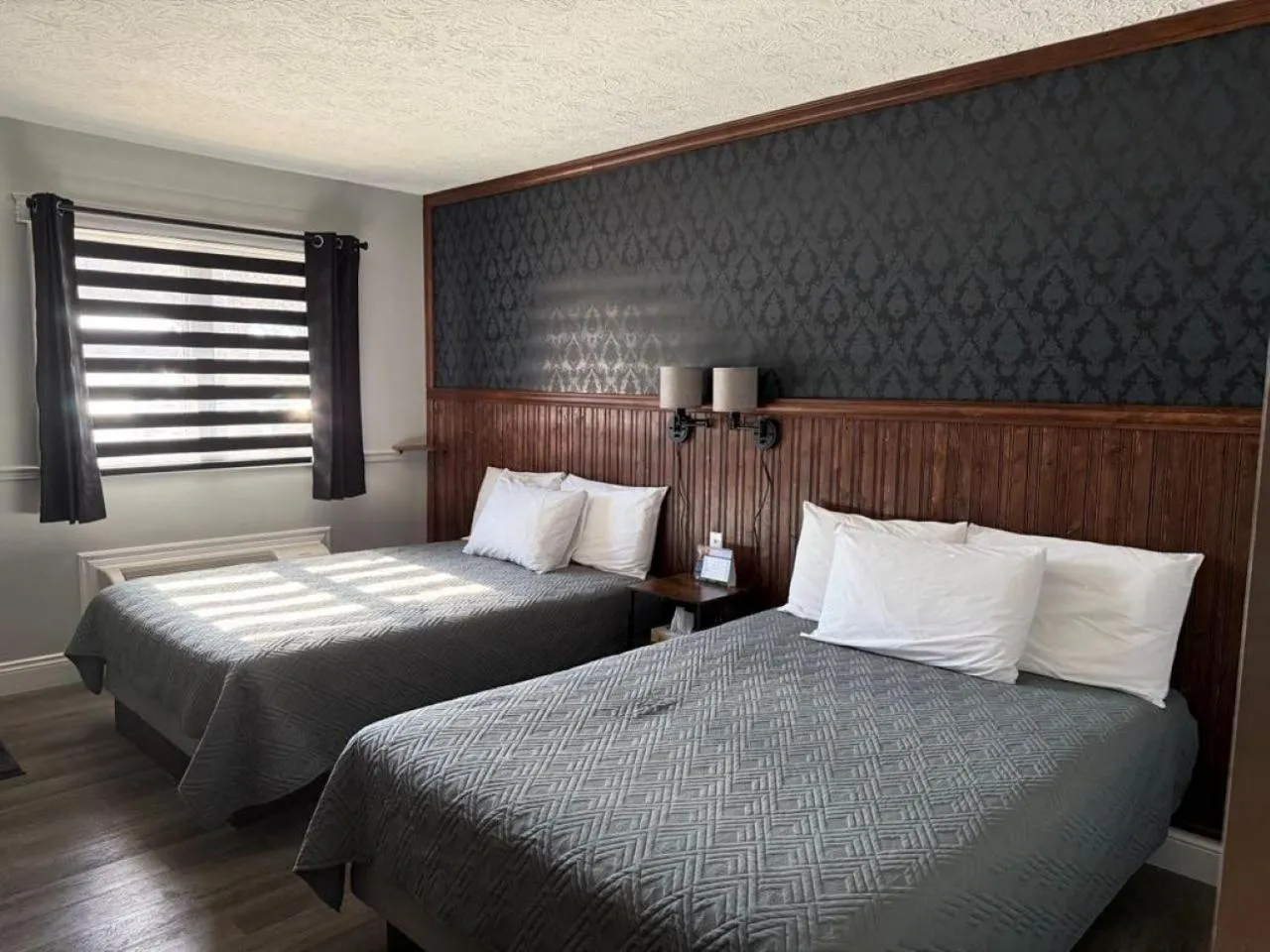 Bed in Auberge MicKy Inc