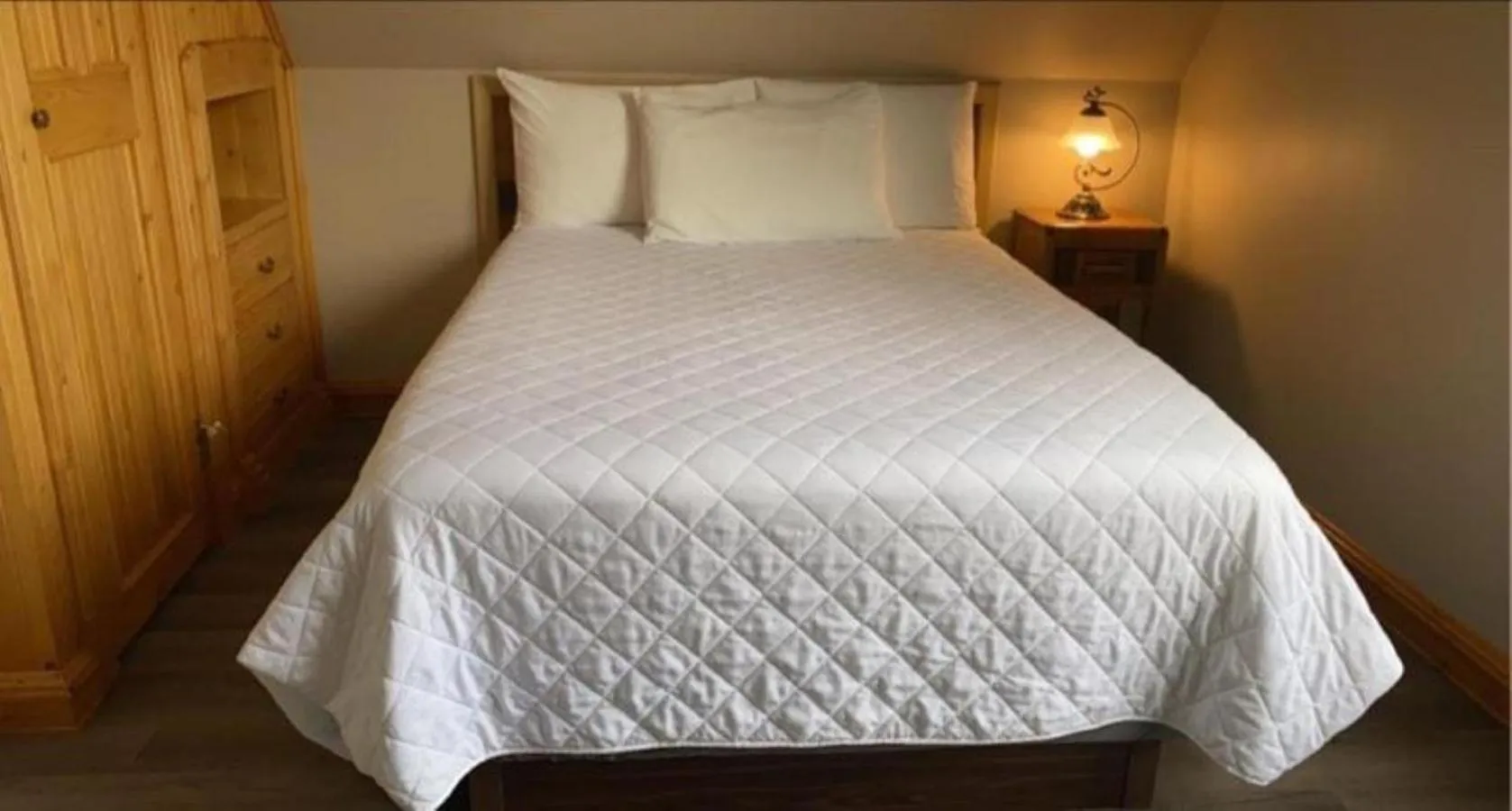 Bed in Auberge MicKy Inc