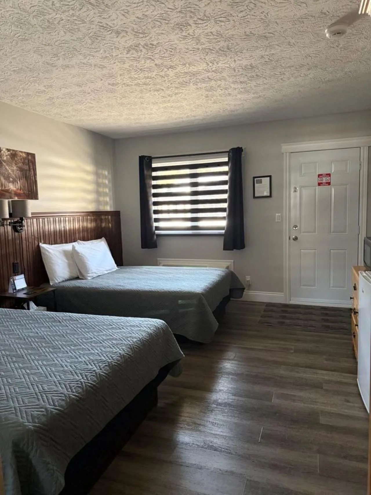 Bed in Auberge MicKy Inc