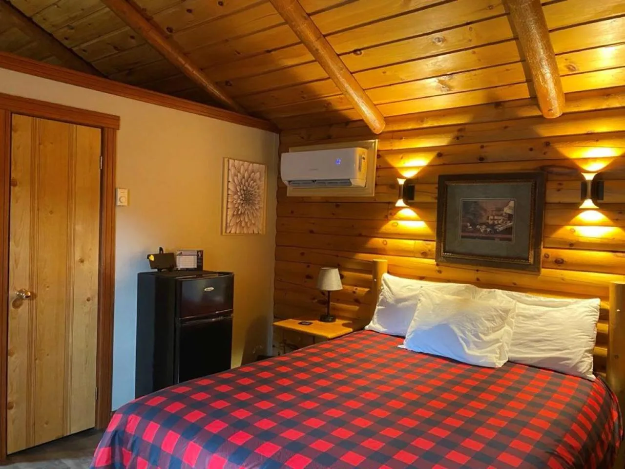 Bed in Auberge MicKy Inc