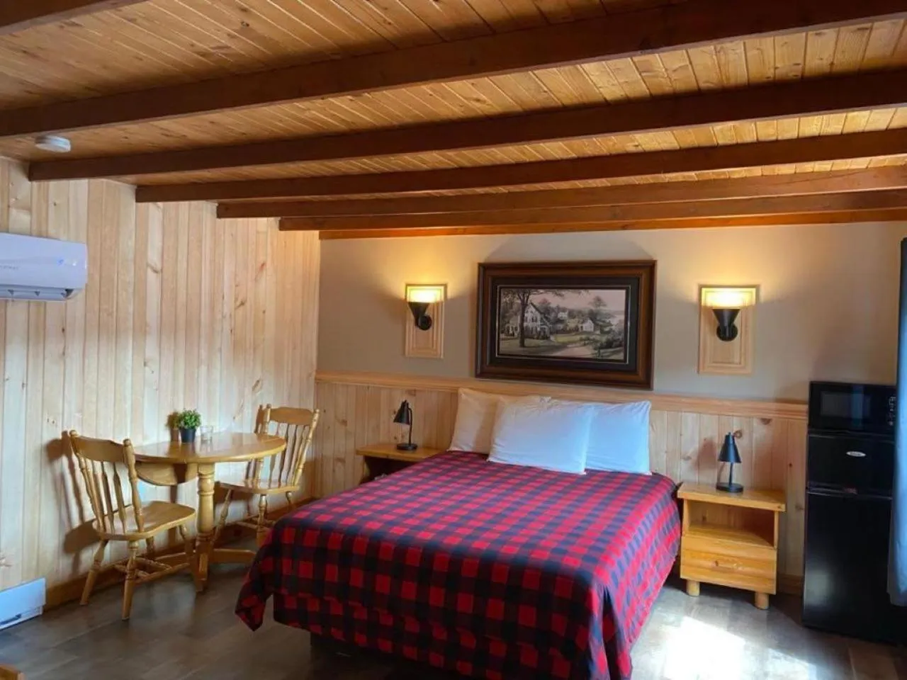 Bed in Auberge MicKy Inc