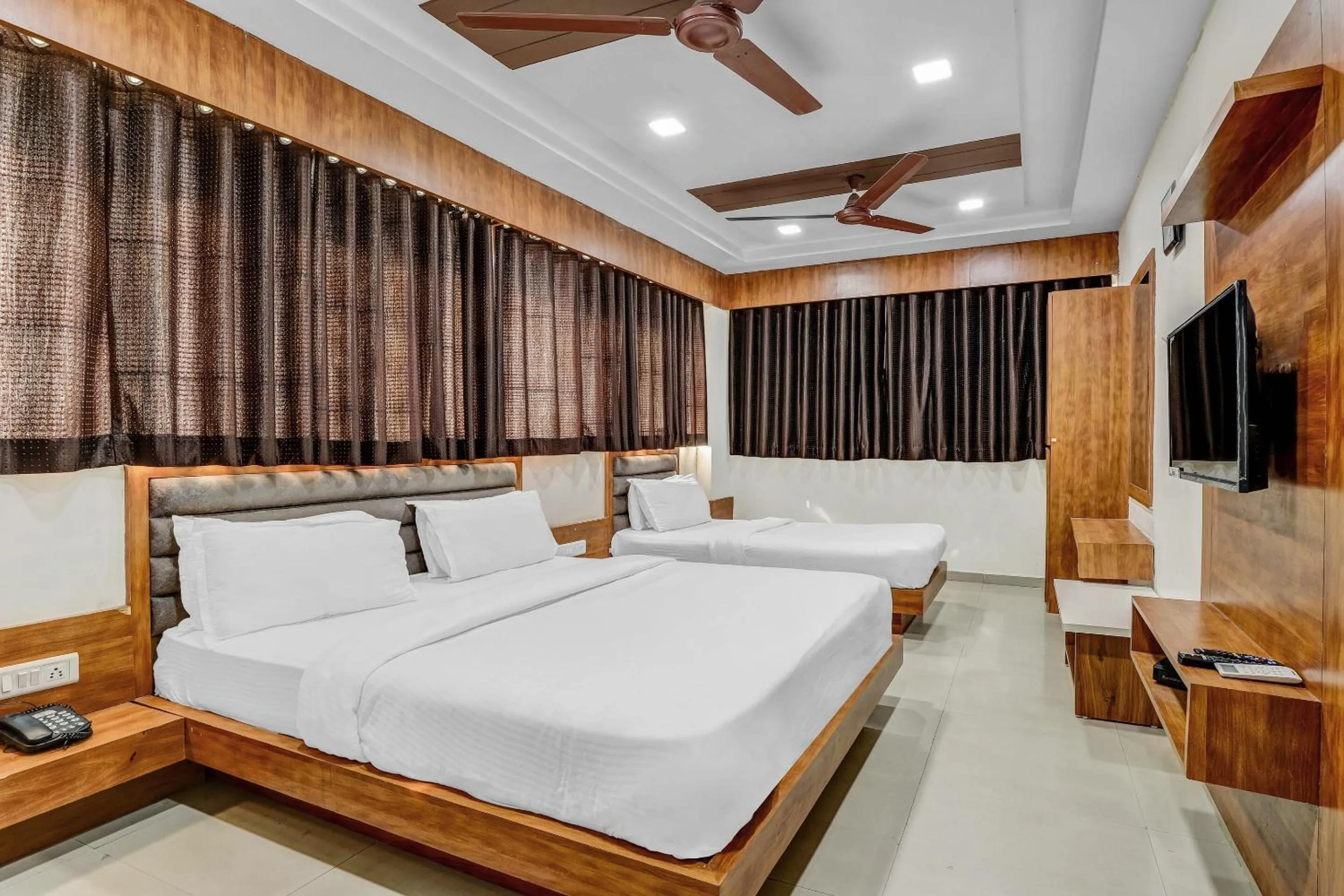 Bedroom in Hotel O Maple view