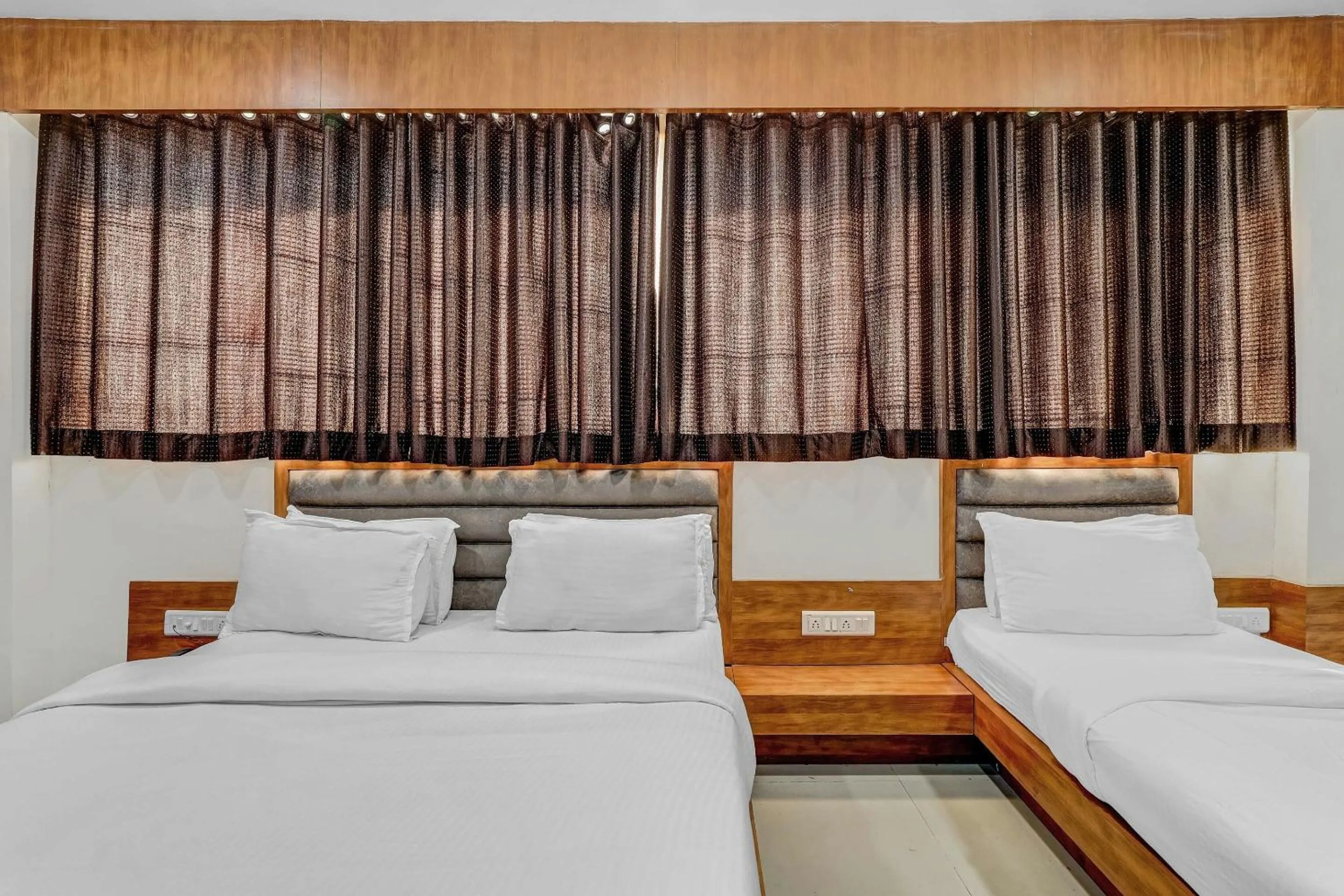 Bedroom in Hotel O Maple view
