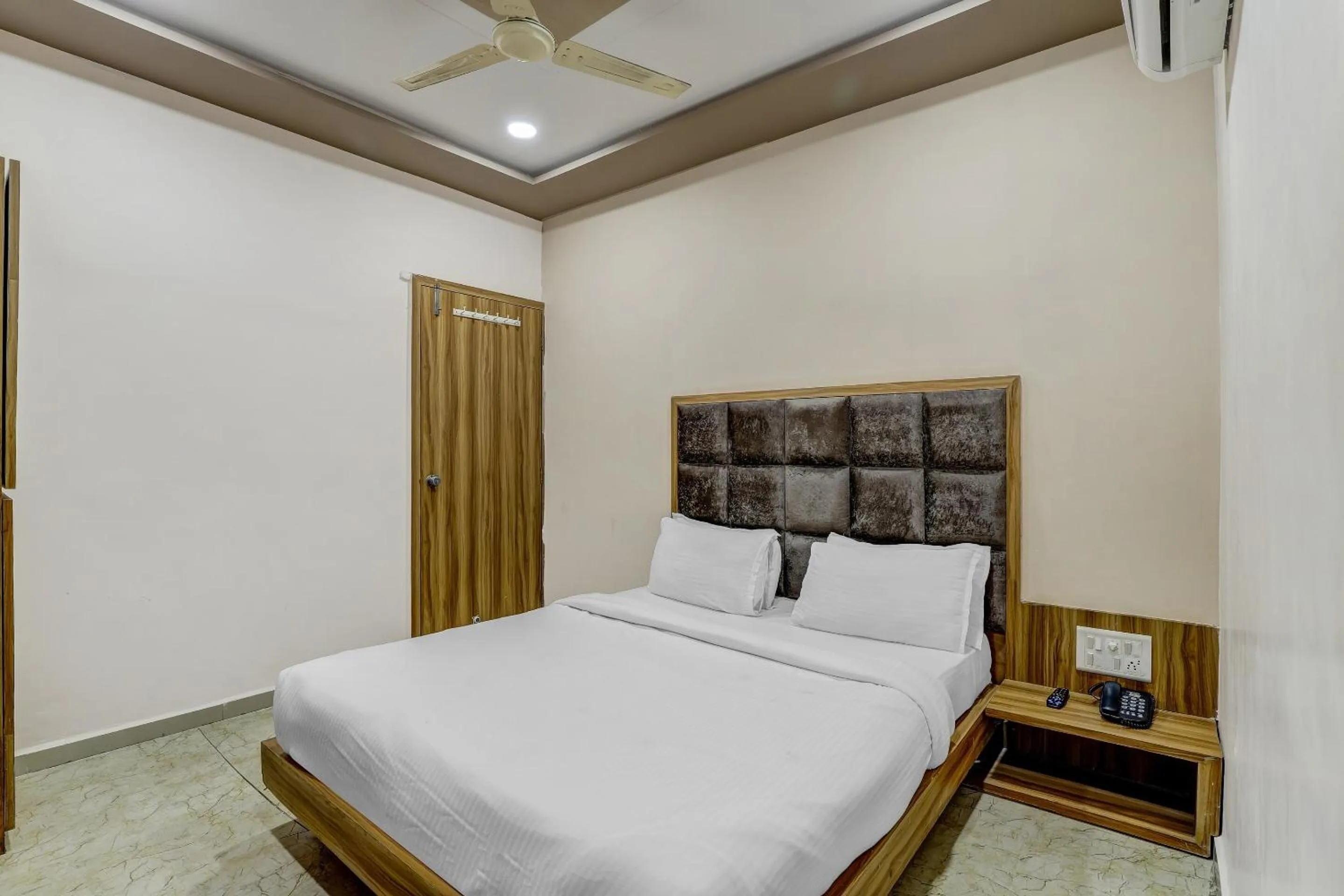 Bedroom in Hotel O Maple view