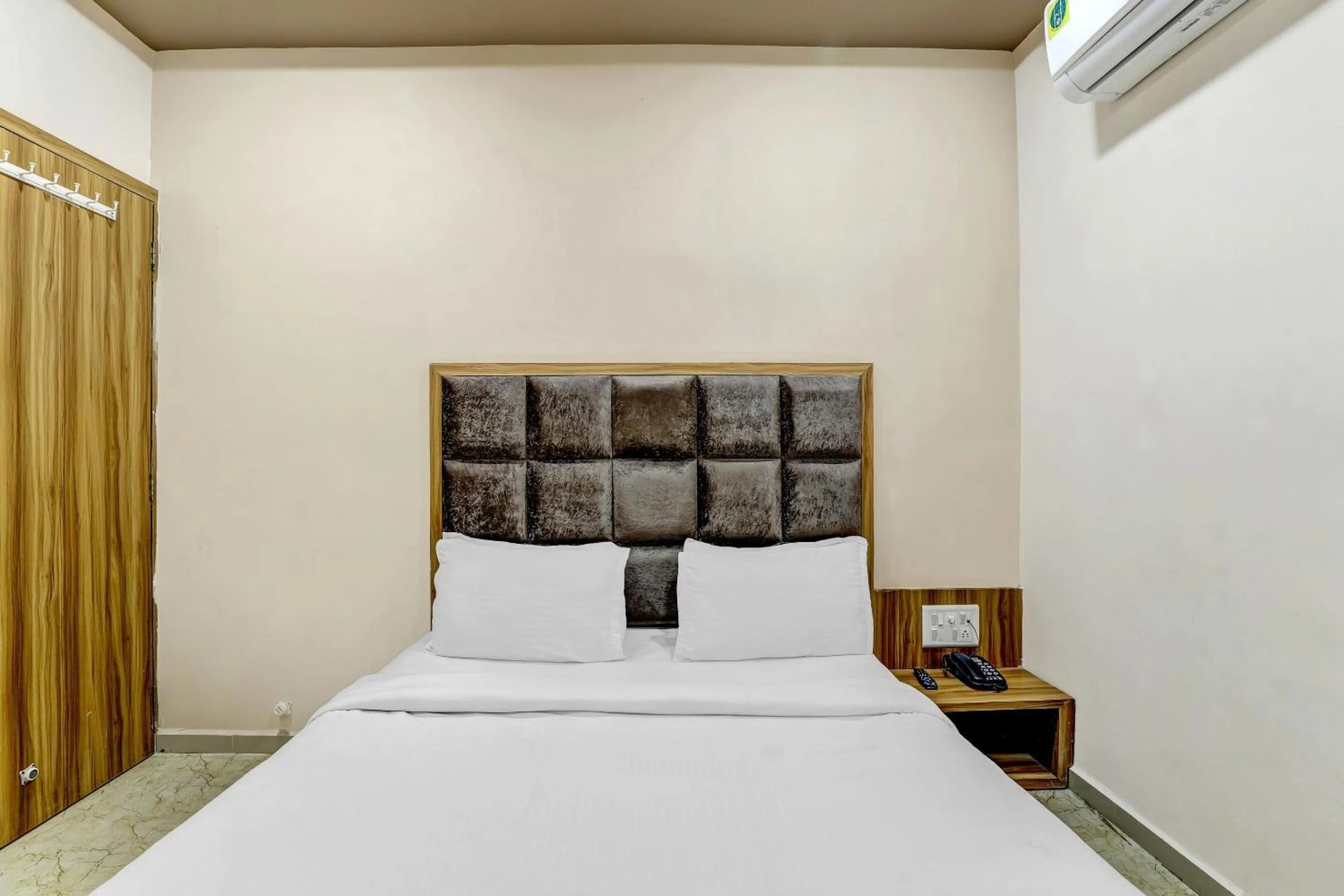 Bedroom in Hotel O Maple view