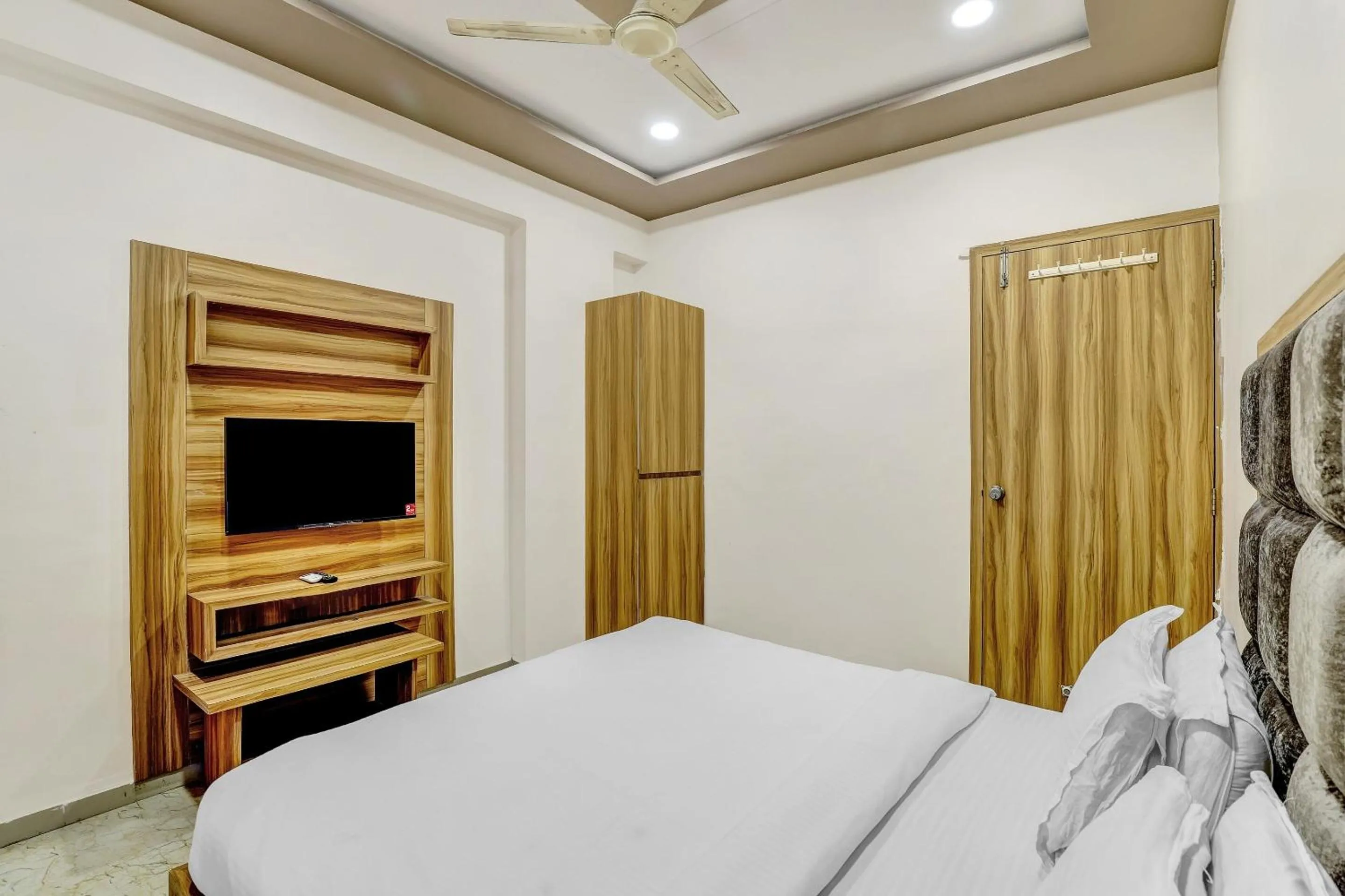 Bedroom in Hotel O Maple view