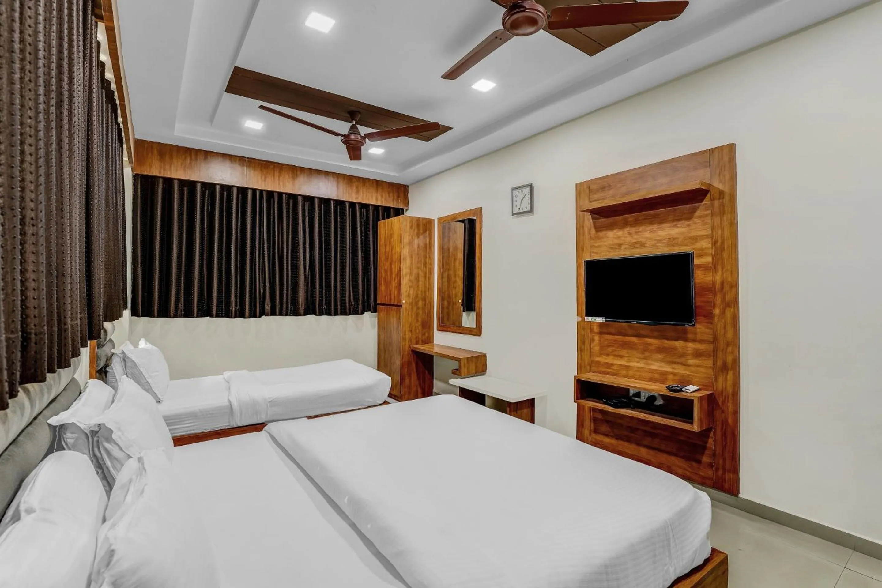 Bedroom in Hotel O Maple view