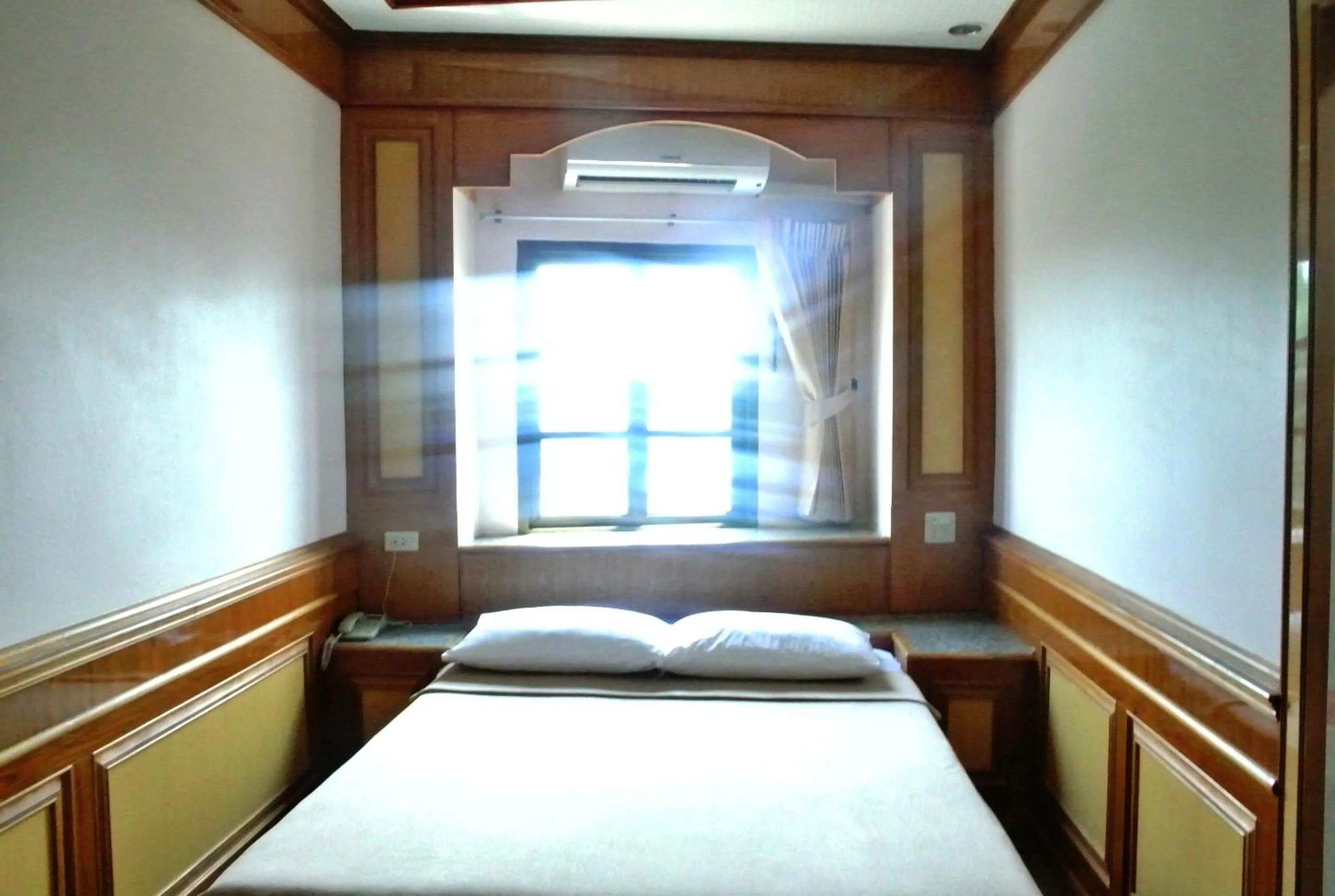 Bed in Rose Garden Hotel