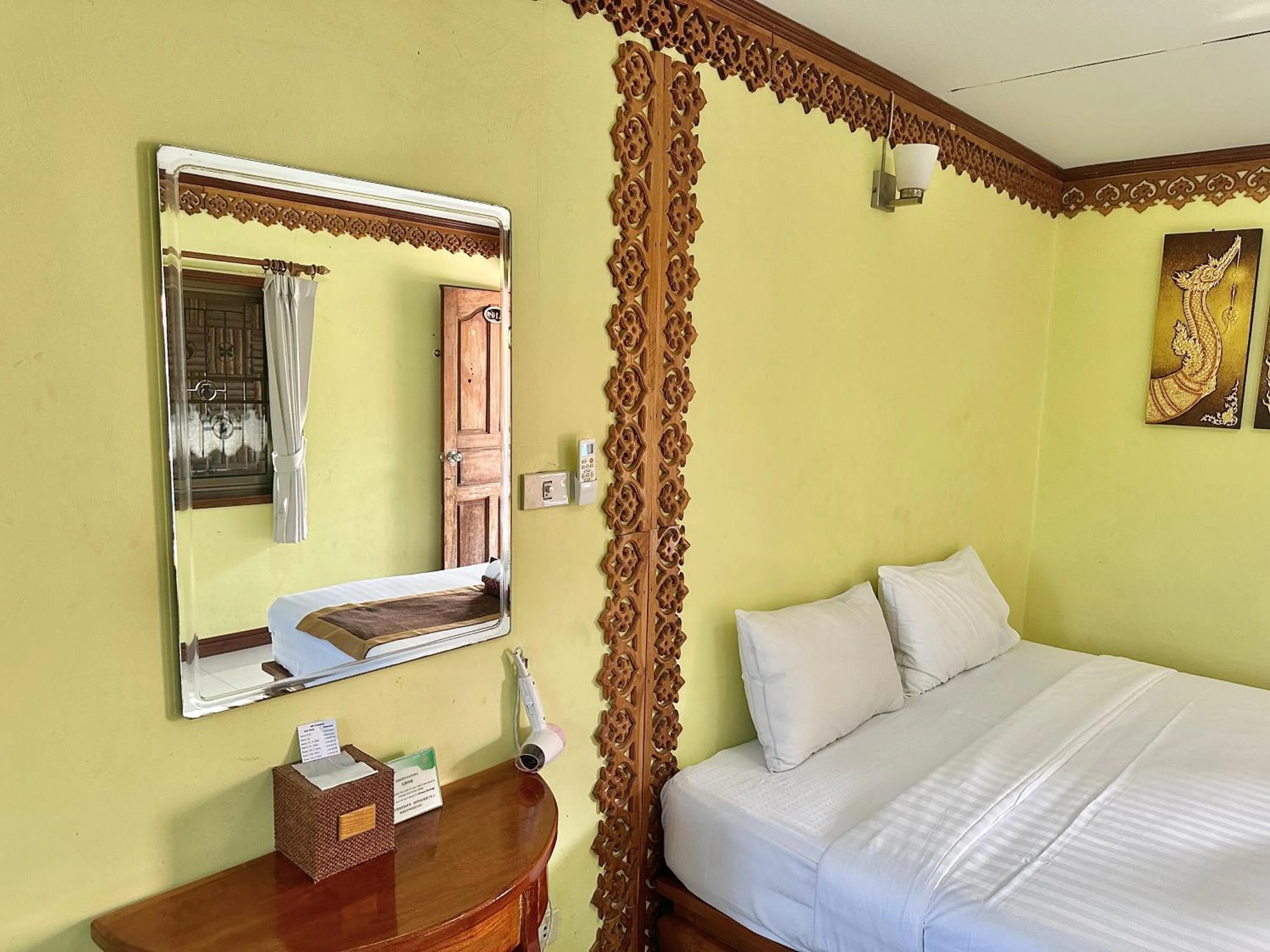 Bed in Montri Resort Donmuang Bangkok