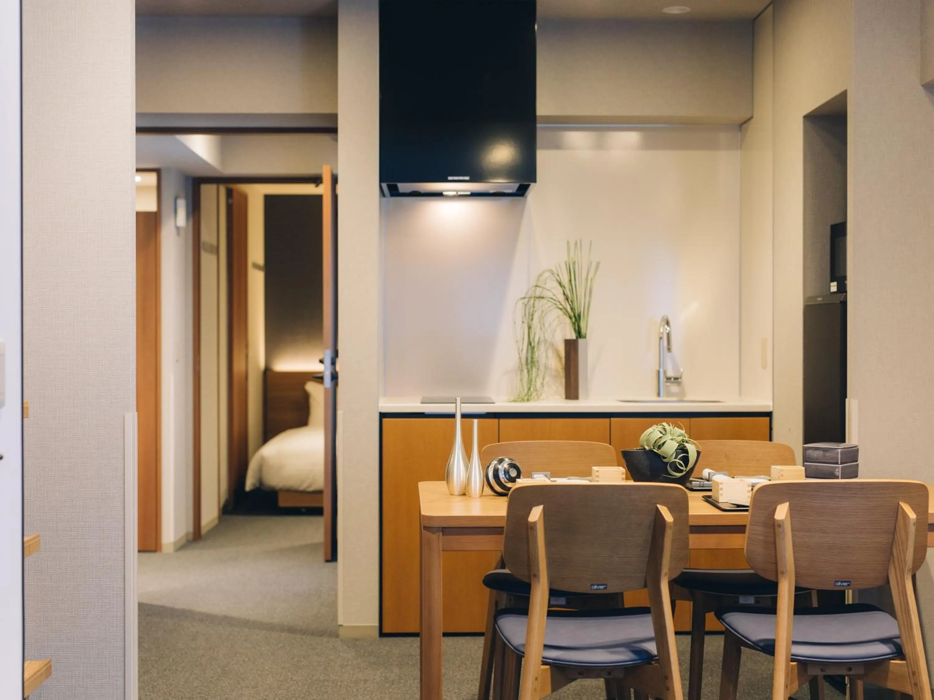 Living room, Bed in MIMARU SUITES Kyoto Shijo