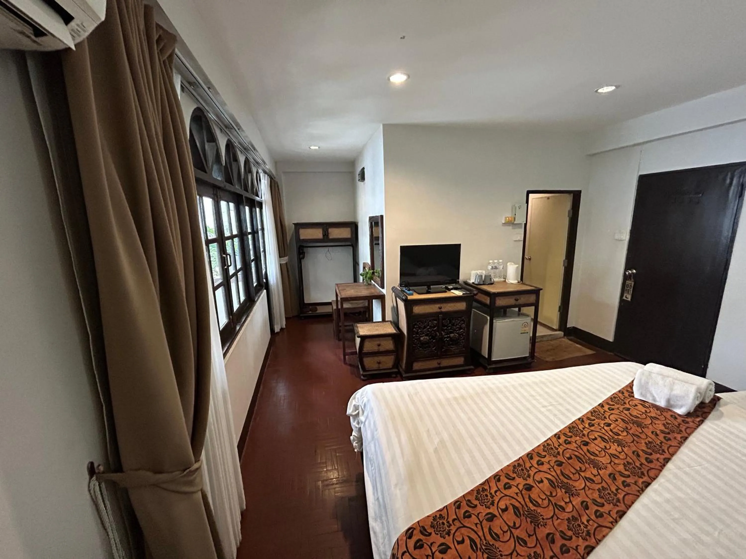 Bed in Kamala's Boutique Guesthouse