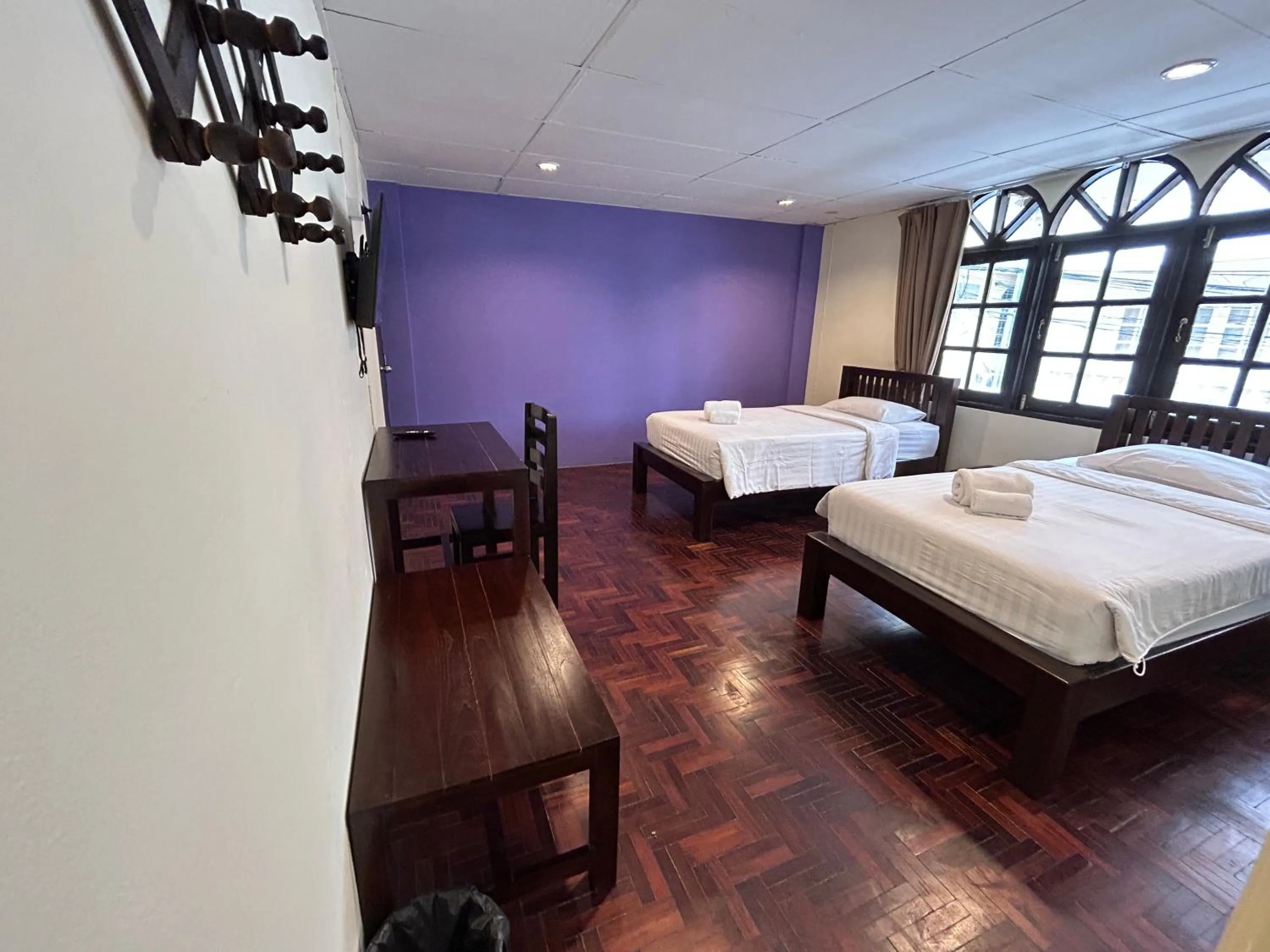 Bed in Kamala's Boutique Guesthouse