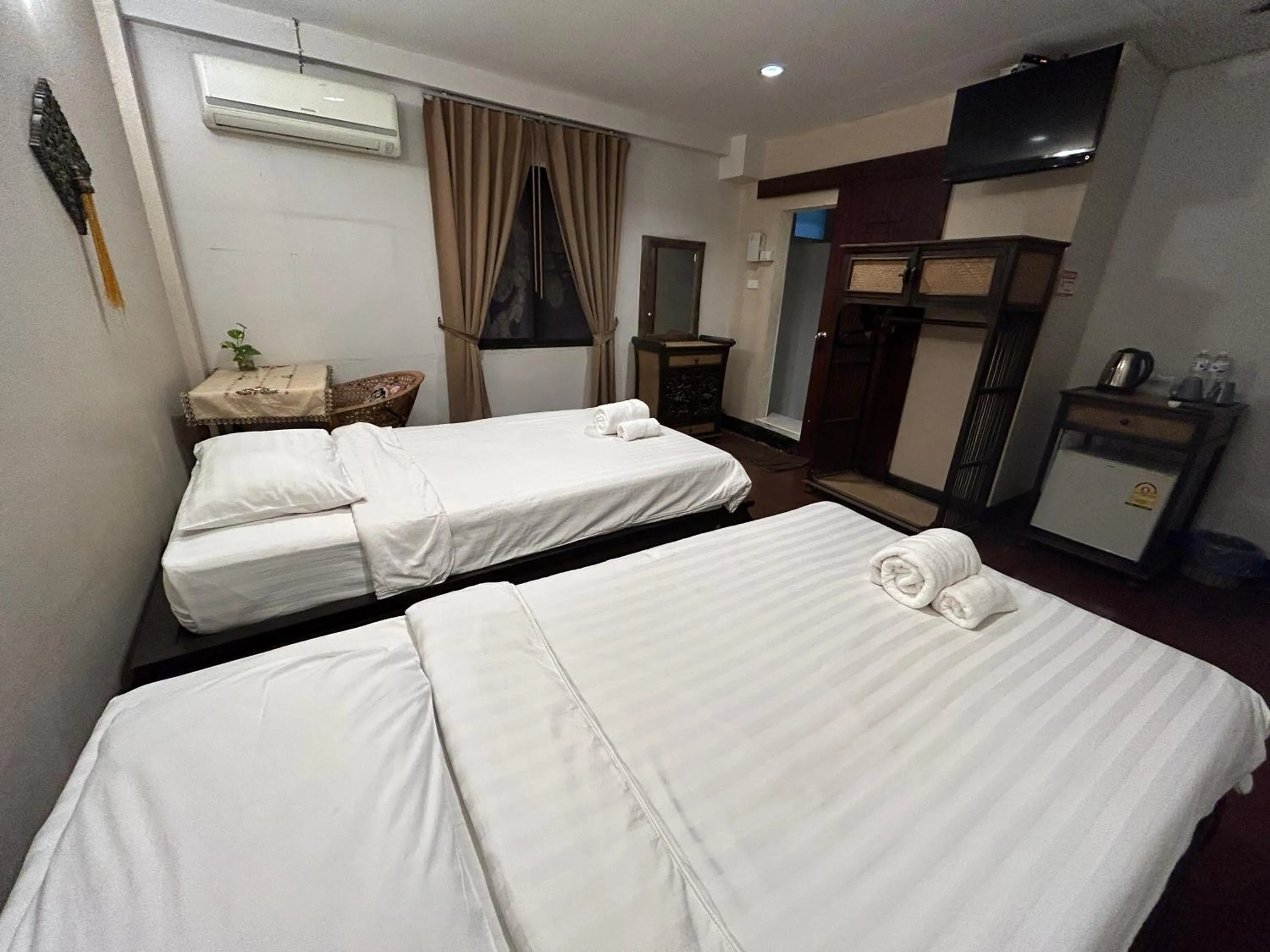 Bed in Kamala's Boutique Guesthouse