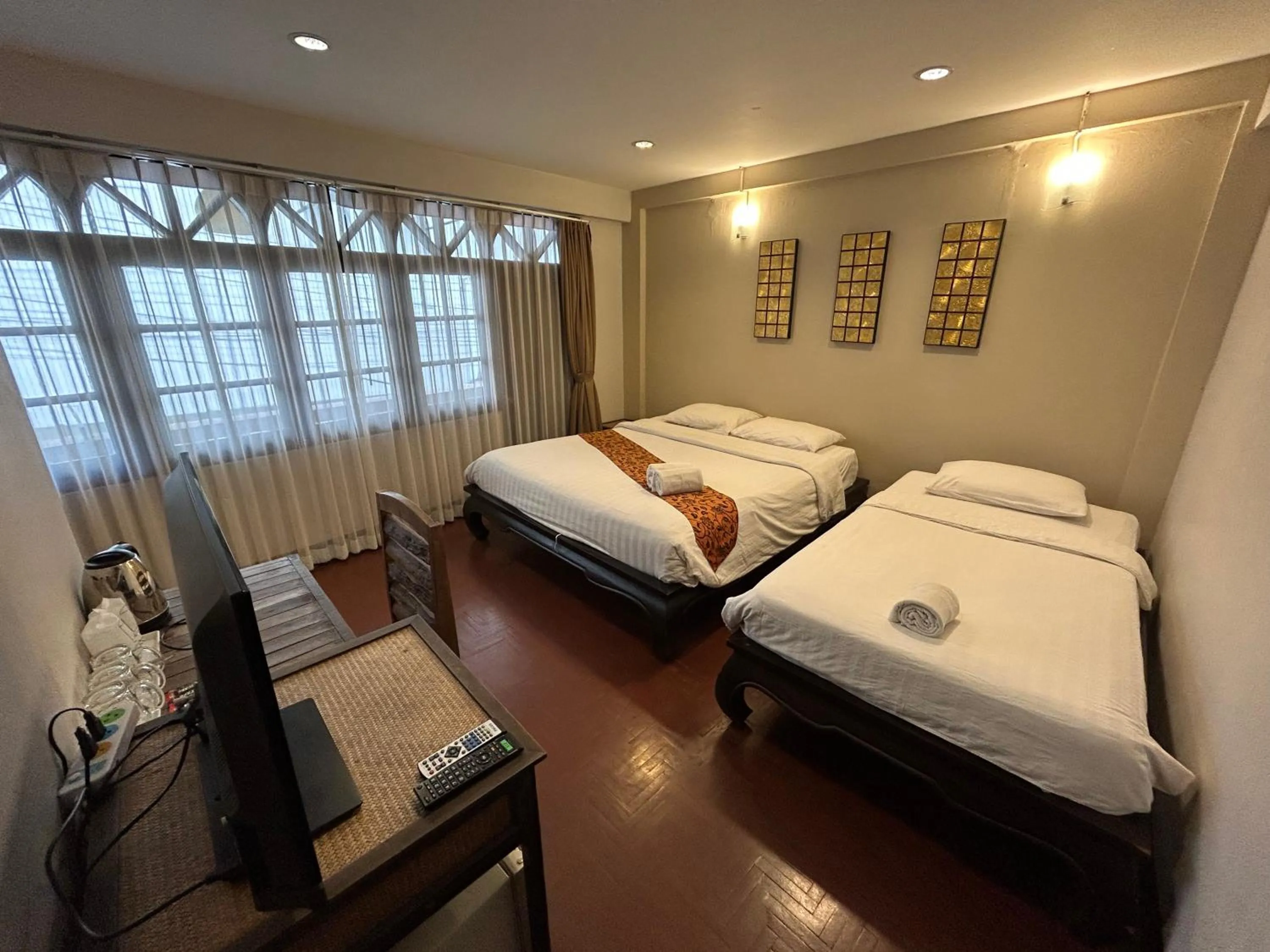 Bed in Kamala's Boutique Guesthouse