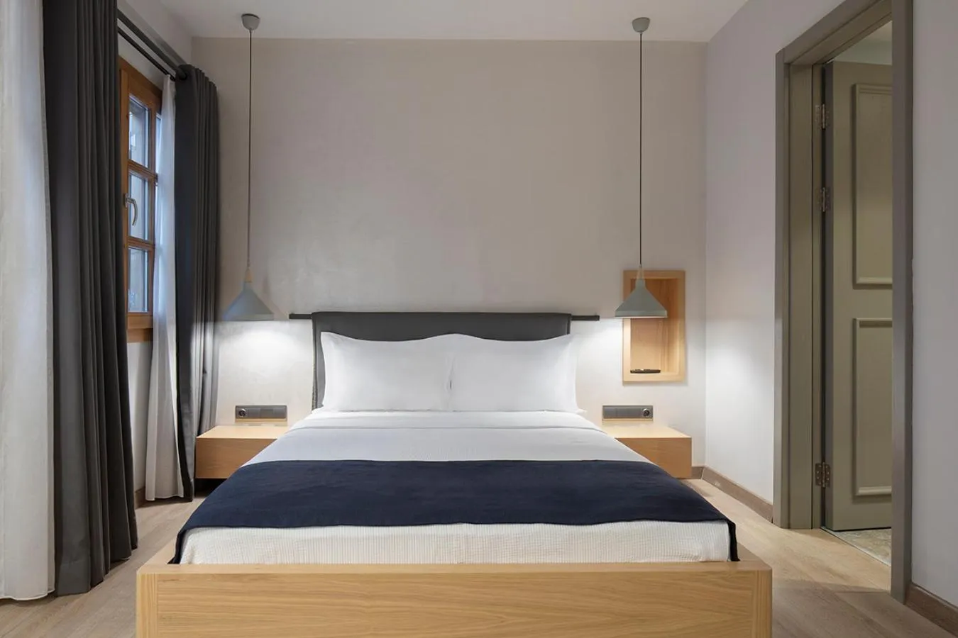 Bed in Mellow Blue Hotel