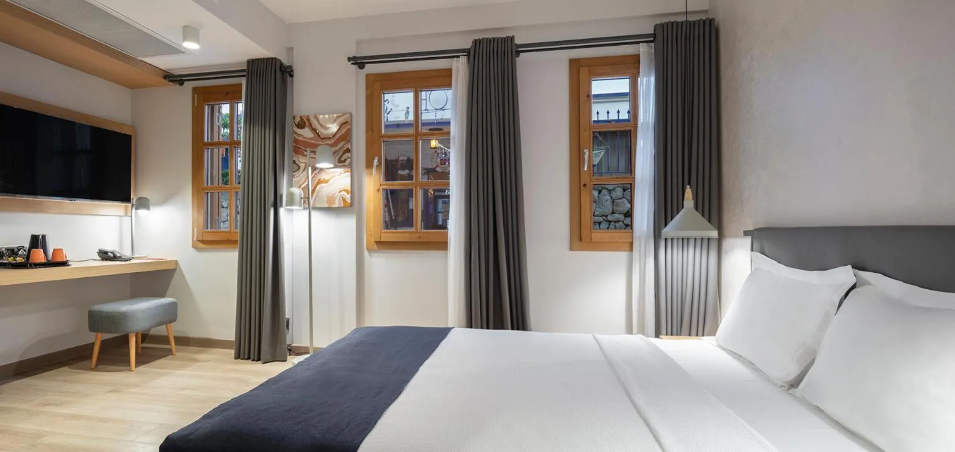 Bed in Mellow Blue Hotel