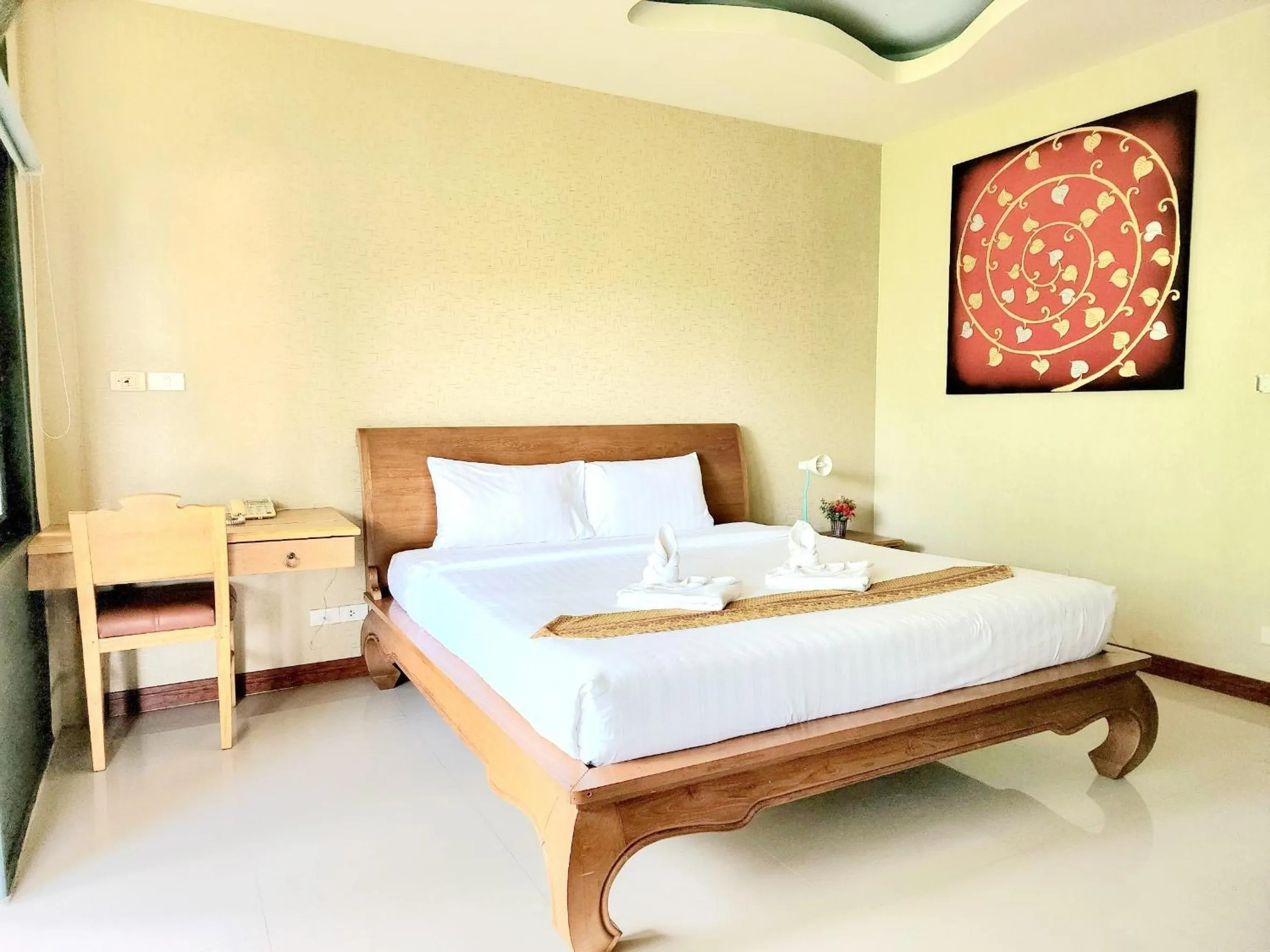 Bed in Kata Garden Resort SHA Extra Plus