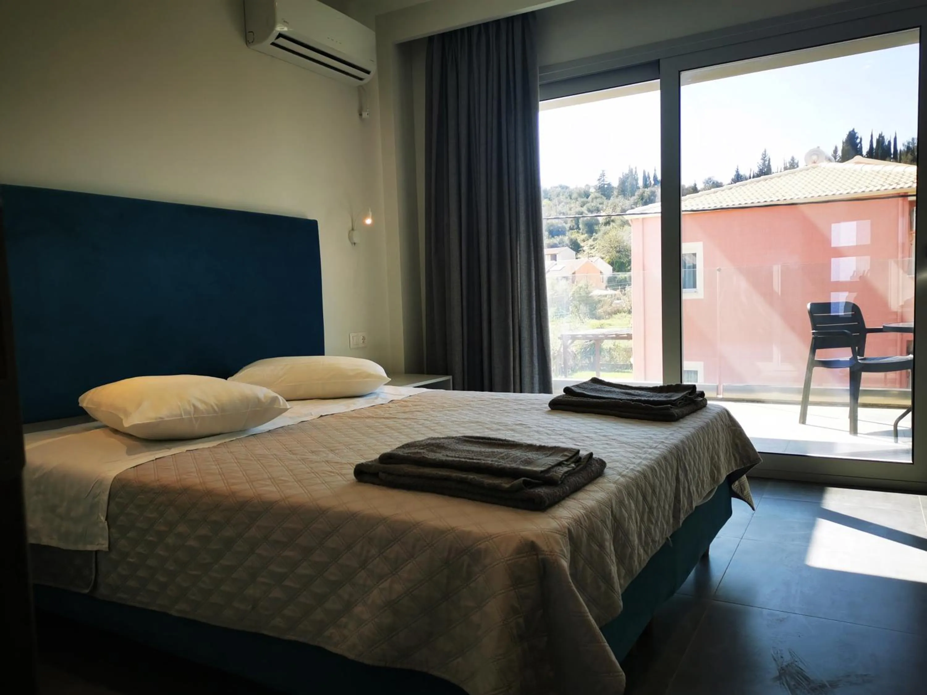 Bed in Anemona Beach apartments