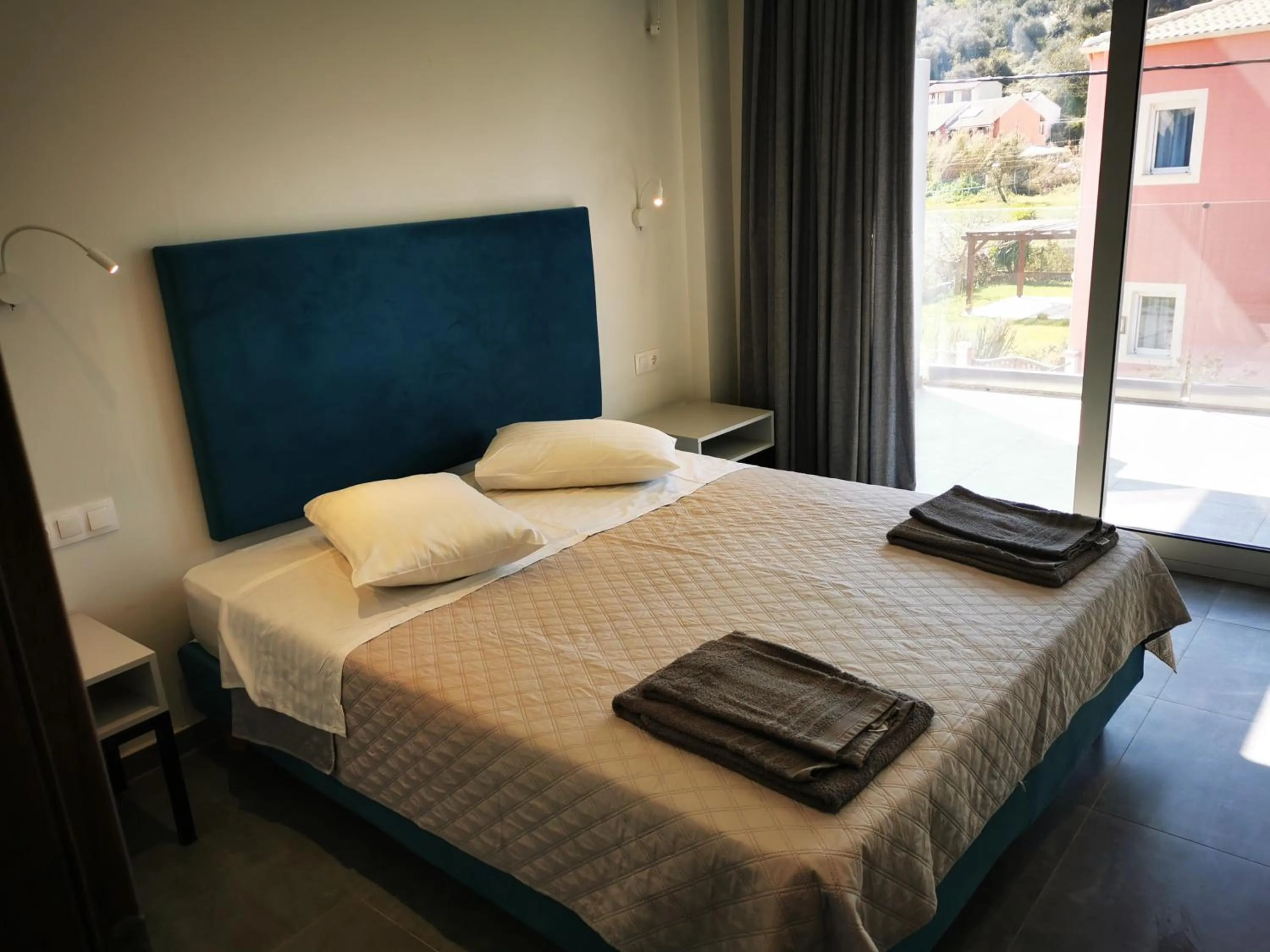 Bed in Anemona Beach apartments