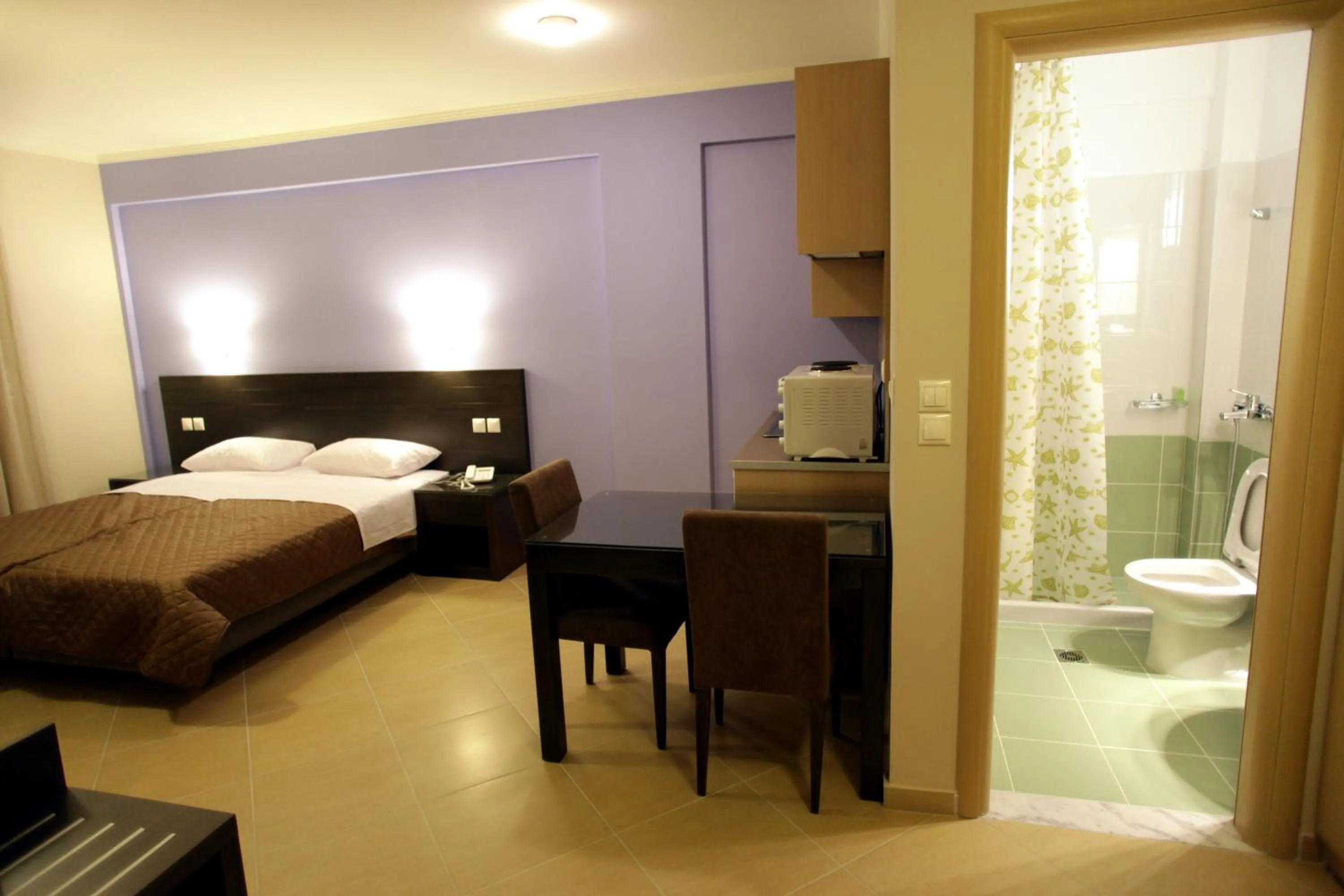 Kitchen or kitchenette, Bed in Cavos Fokidos