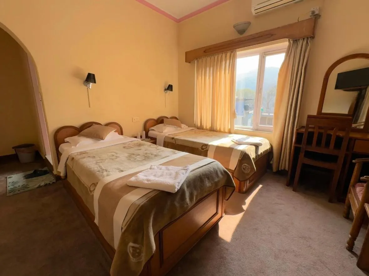 Bed in Green Tara Hotel