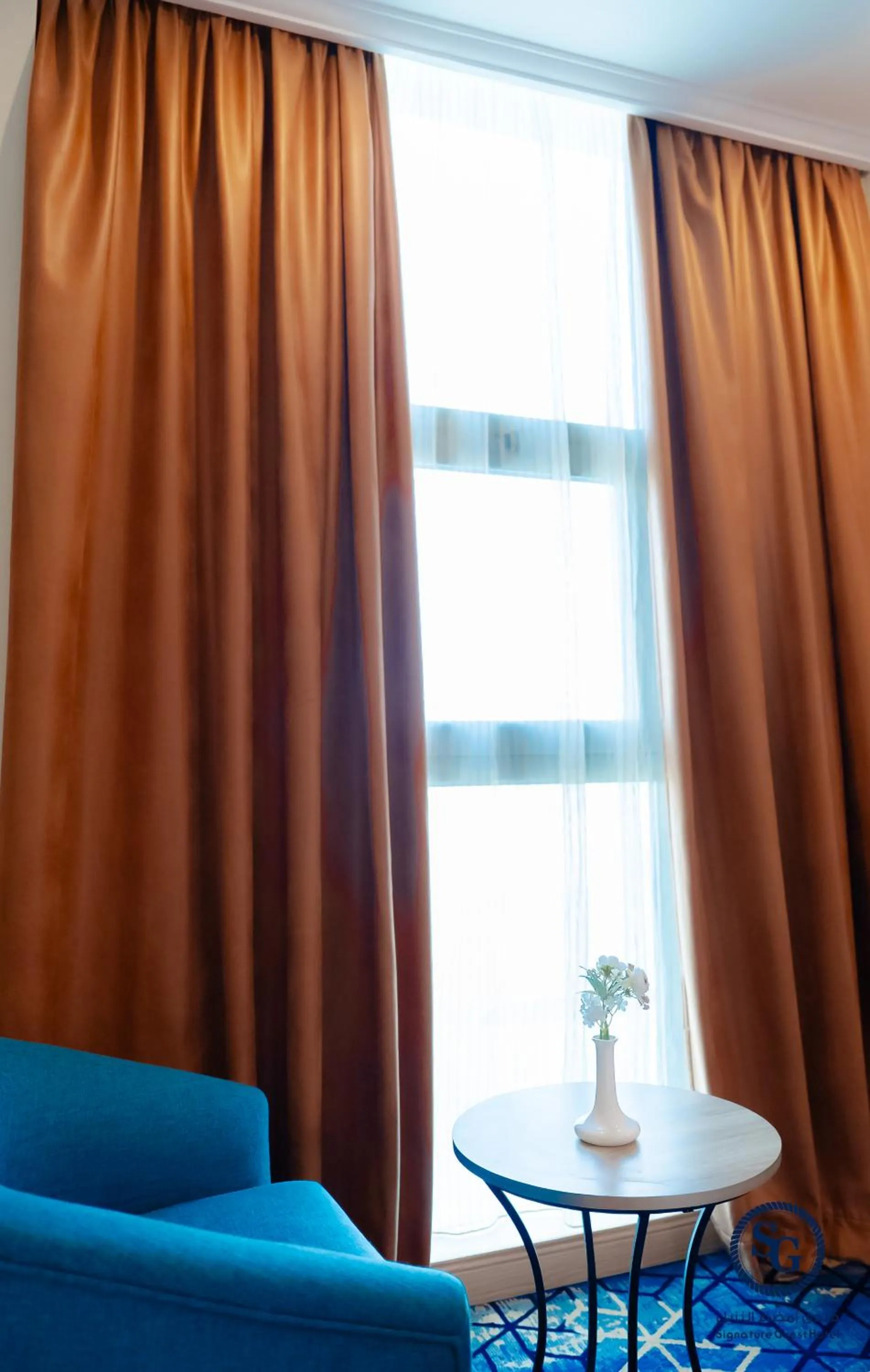 Seating area in Signature Guest Hotel فندق إمضاء النزيل الفندقية