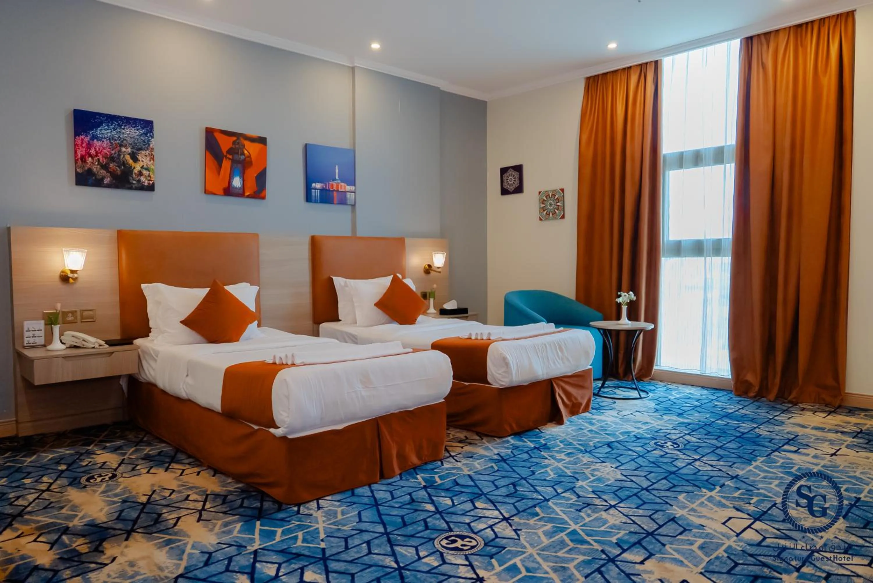 Bed in Signature Guest Hotel فندق إمضاء النزيل الفندقية