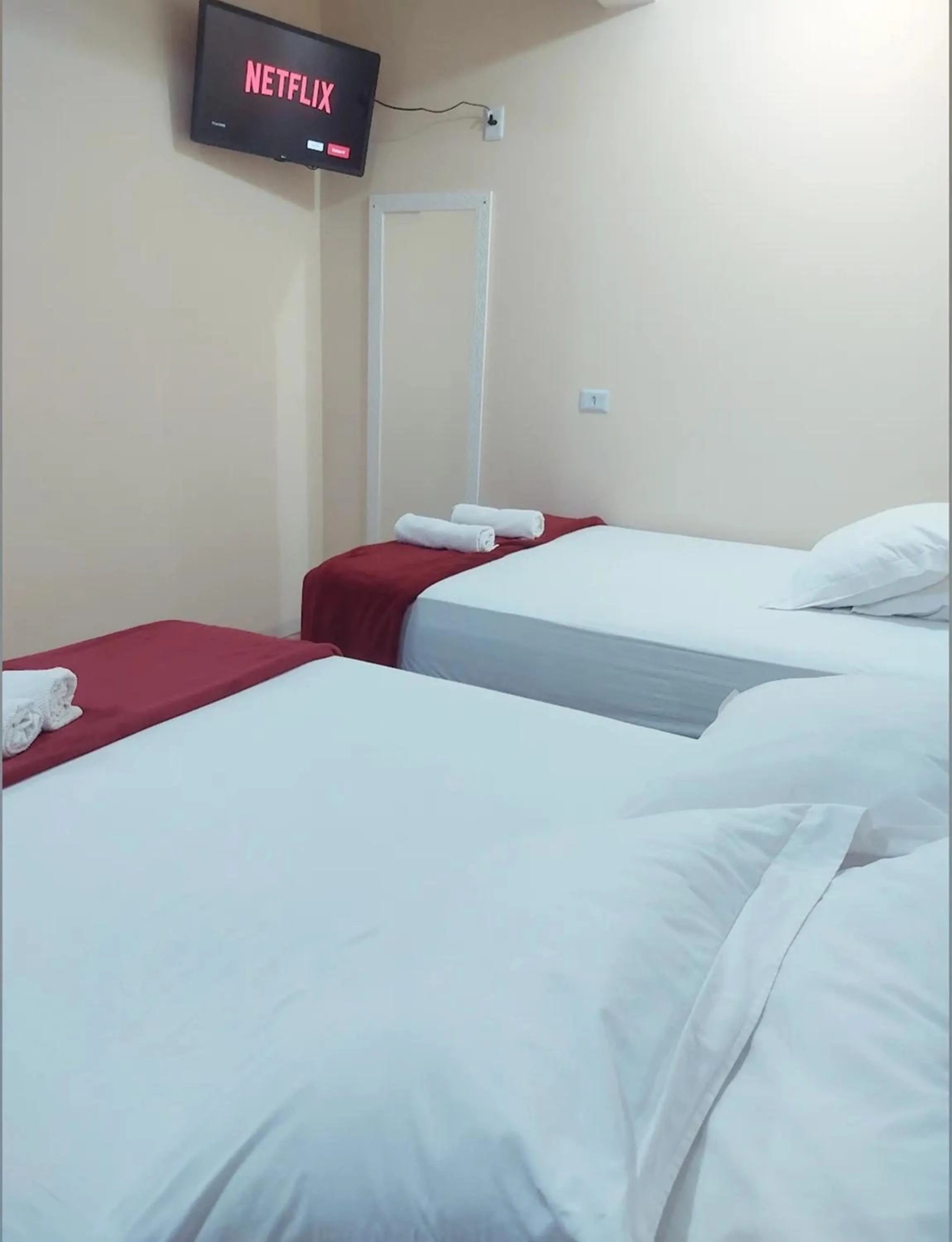 Bed in Pousada Helena