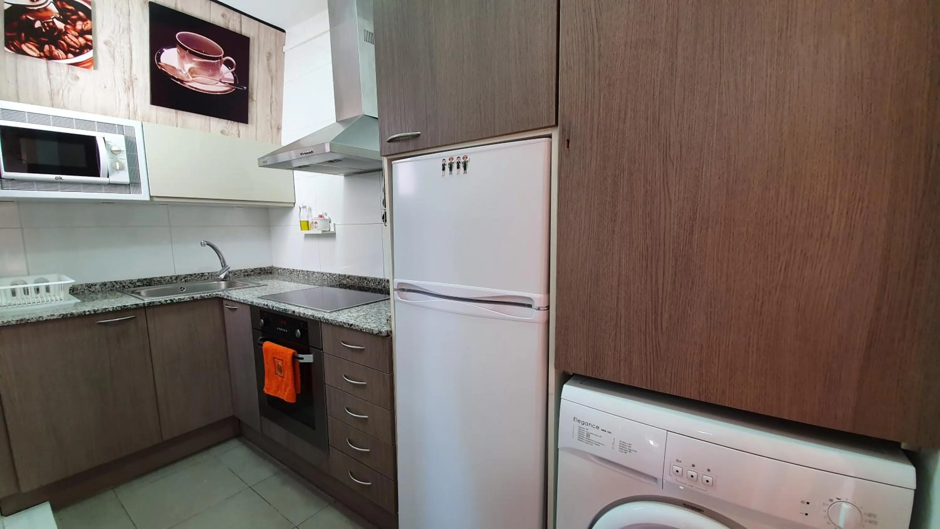 Kitchen or kitchenette in Ático, terraza y Barbacoa