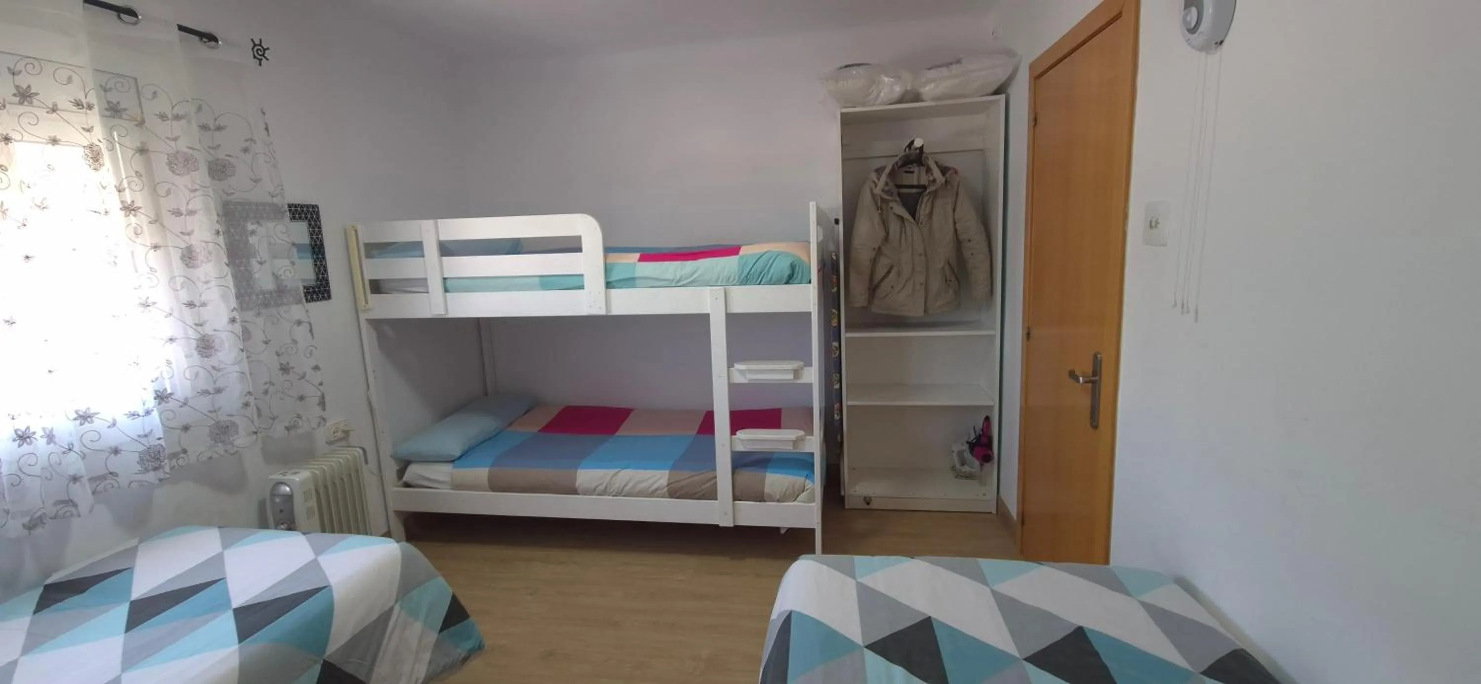 Bedroom, Bed in Ático, terraza y Barbacoa