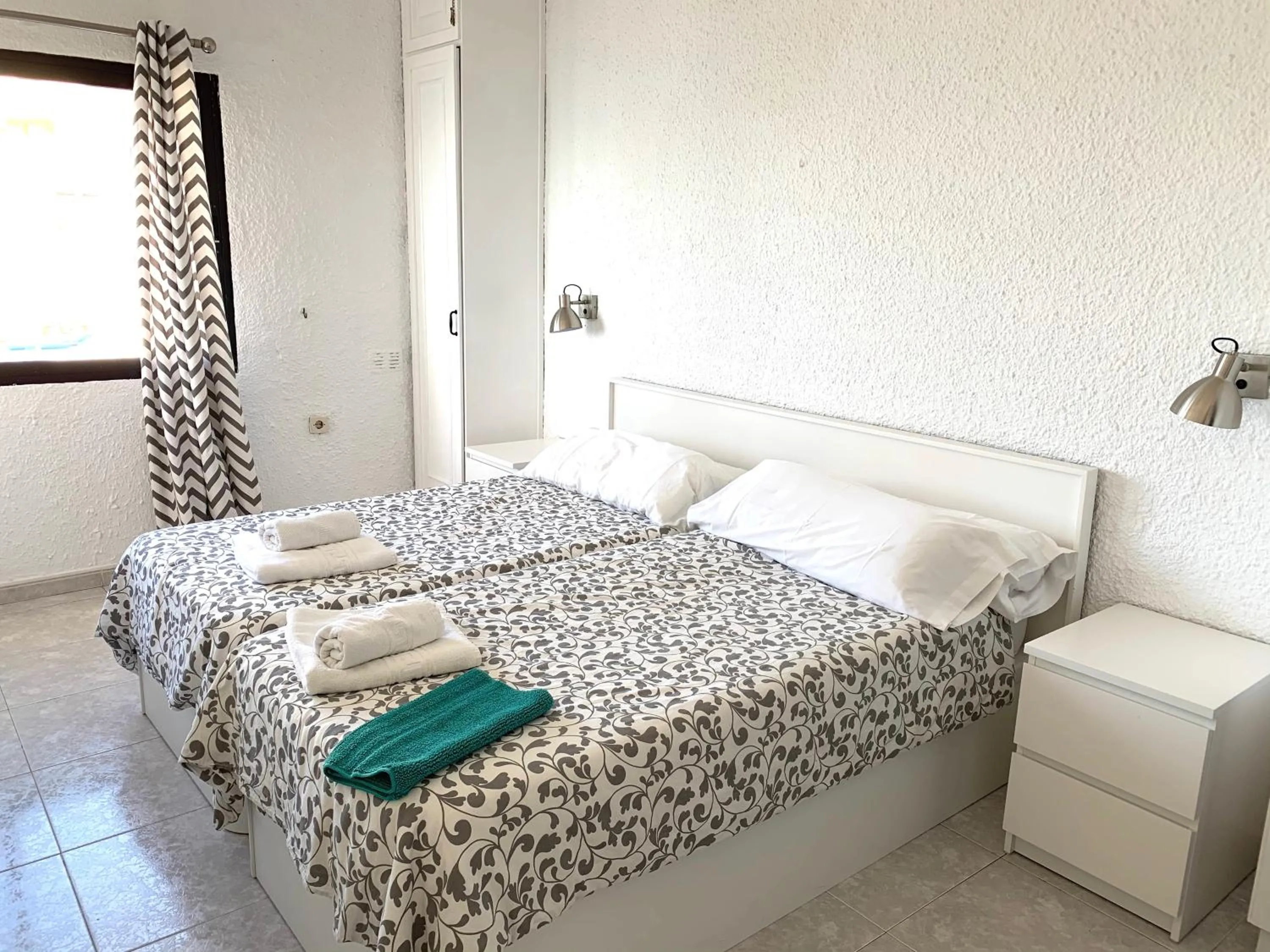 Bed in Skol Apartments Marbella