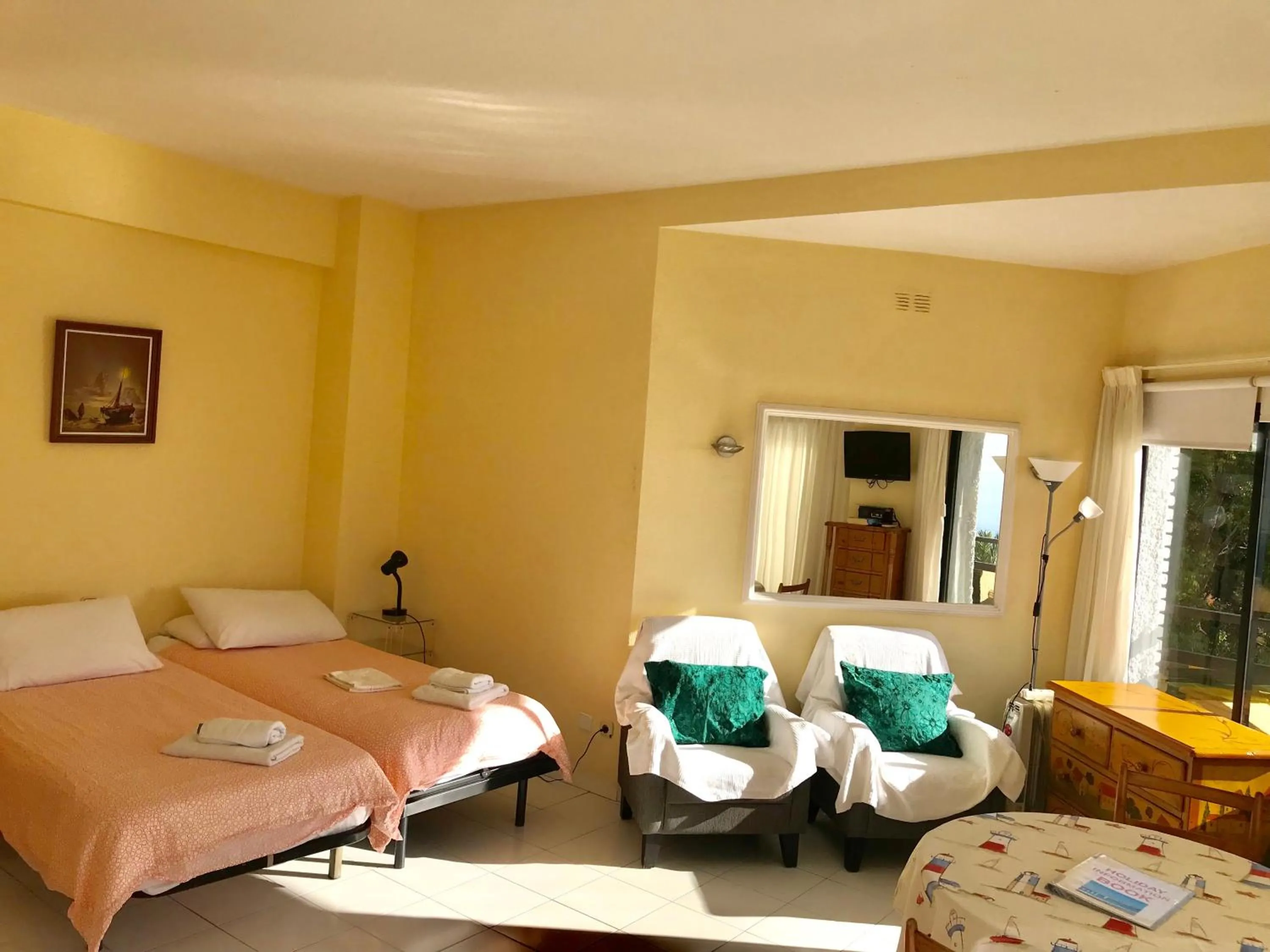 Living room, Bed in Skol Apartments Marbella