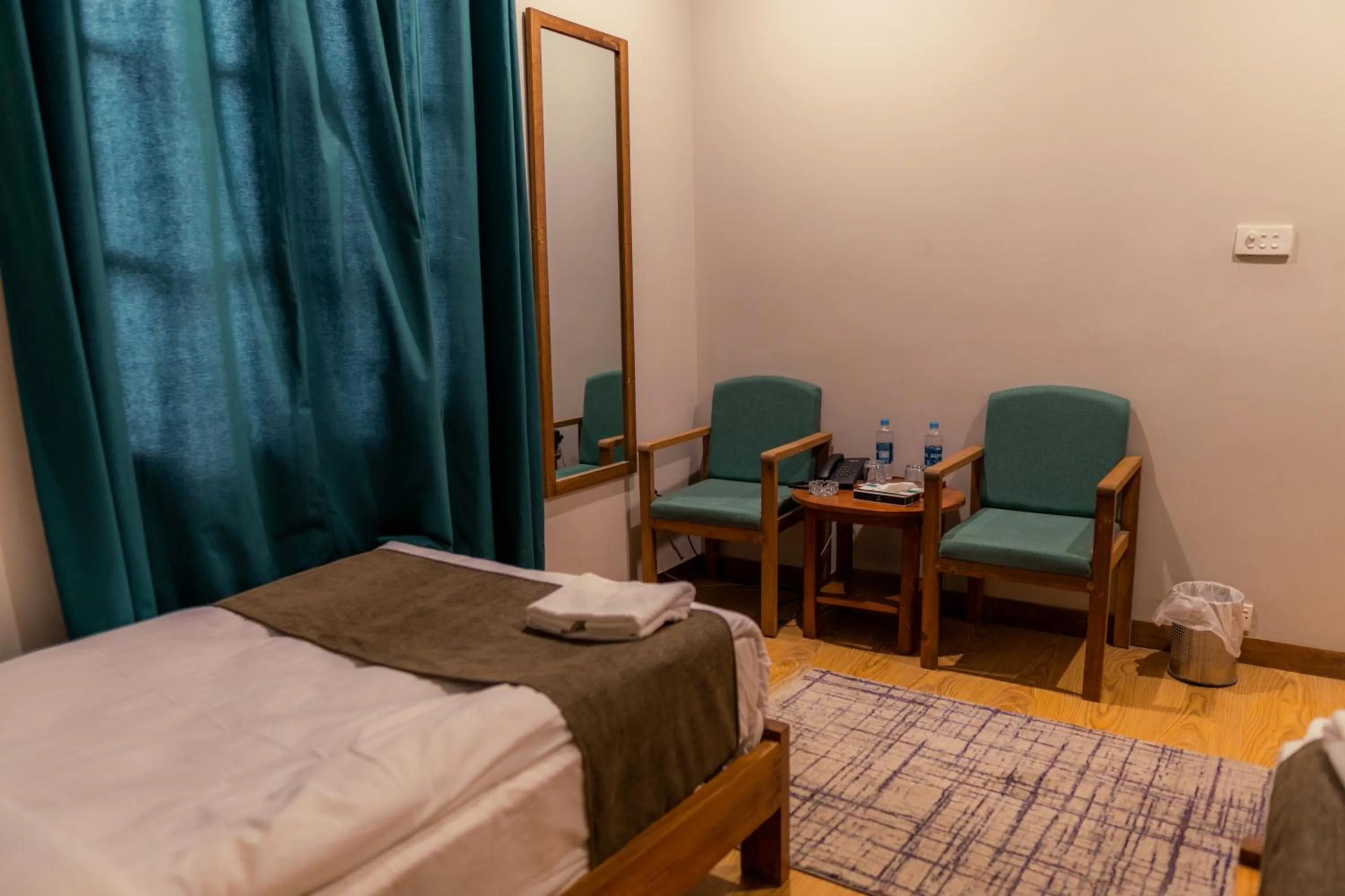 Bedroom, Bed in Dynasty Hotel Skardu