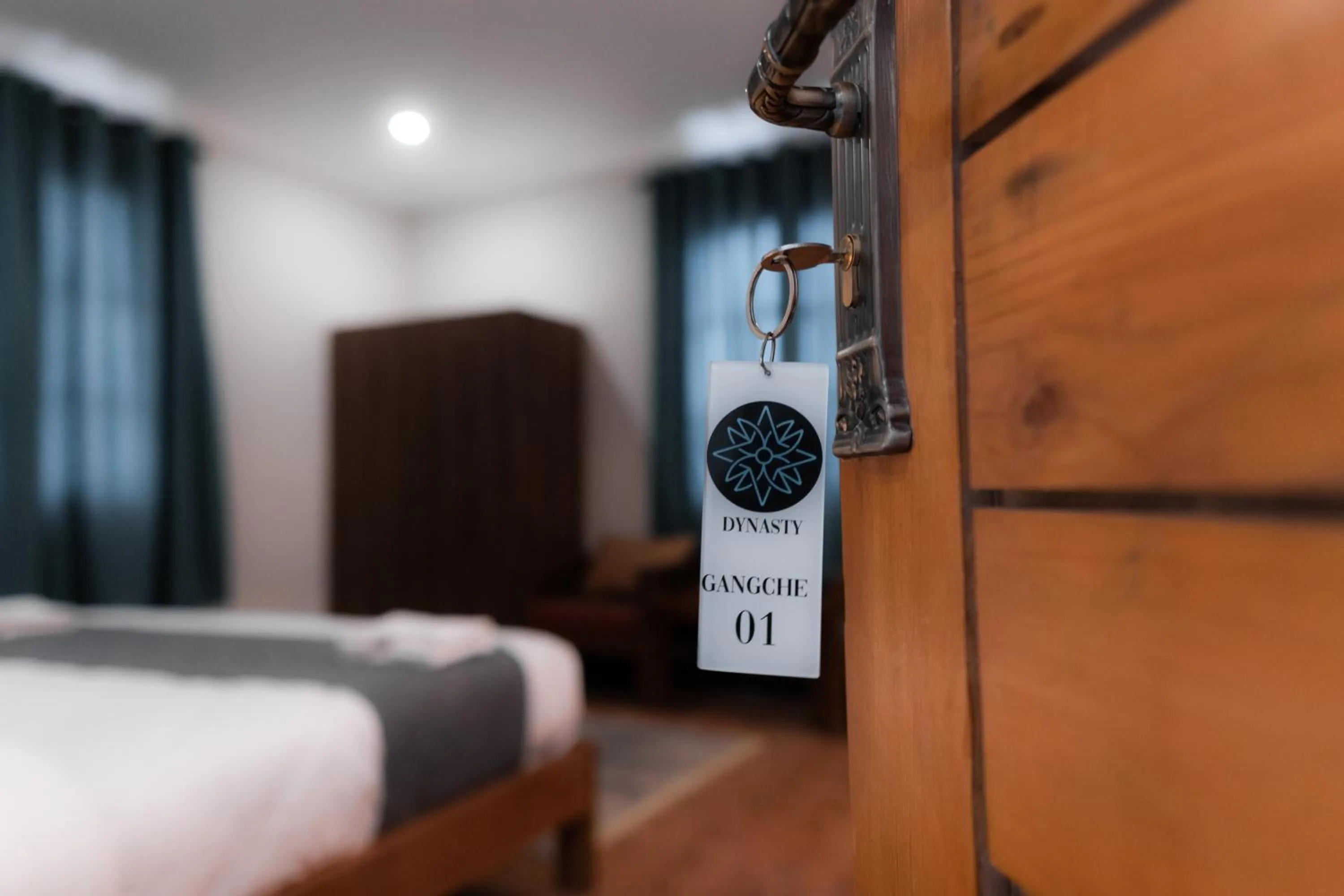 Photo of the whole room, Bed in Dynasty Hotel Skardu