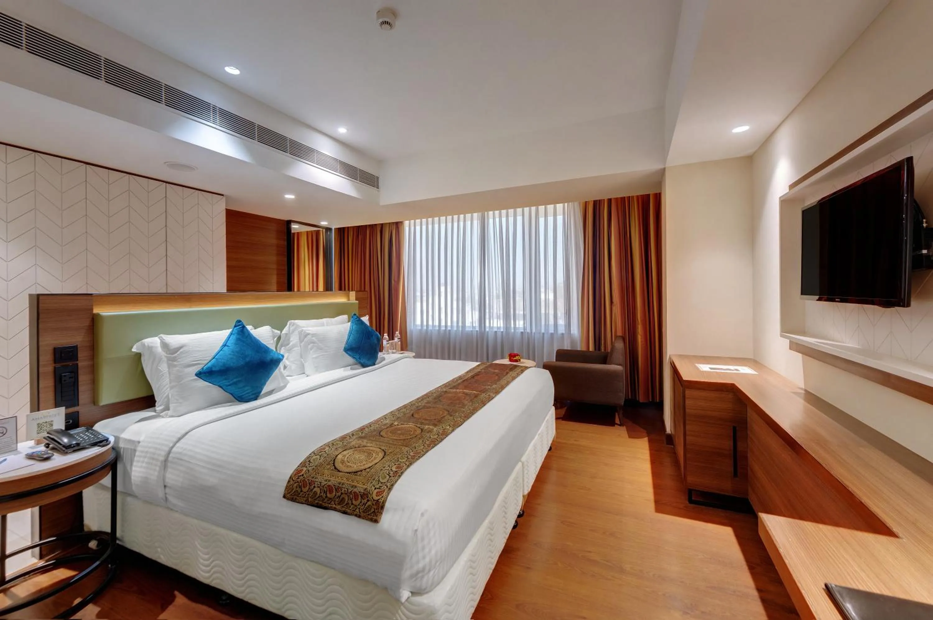 Bedroom, Bed in Amarpreet, Chhatrapati Sambhajinagar - AM Hotel Kollection