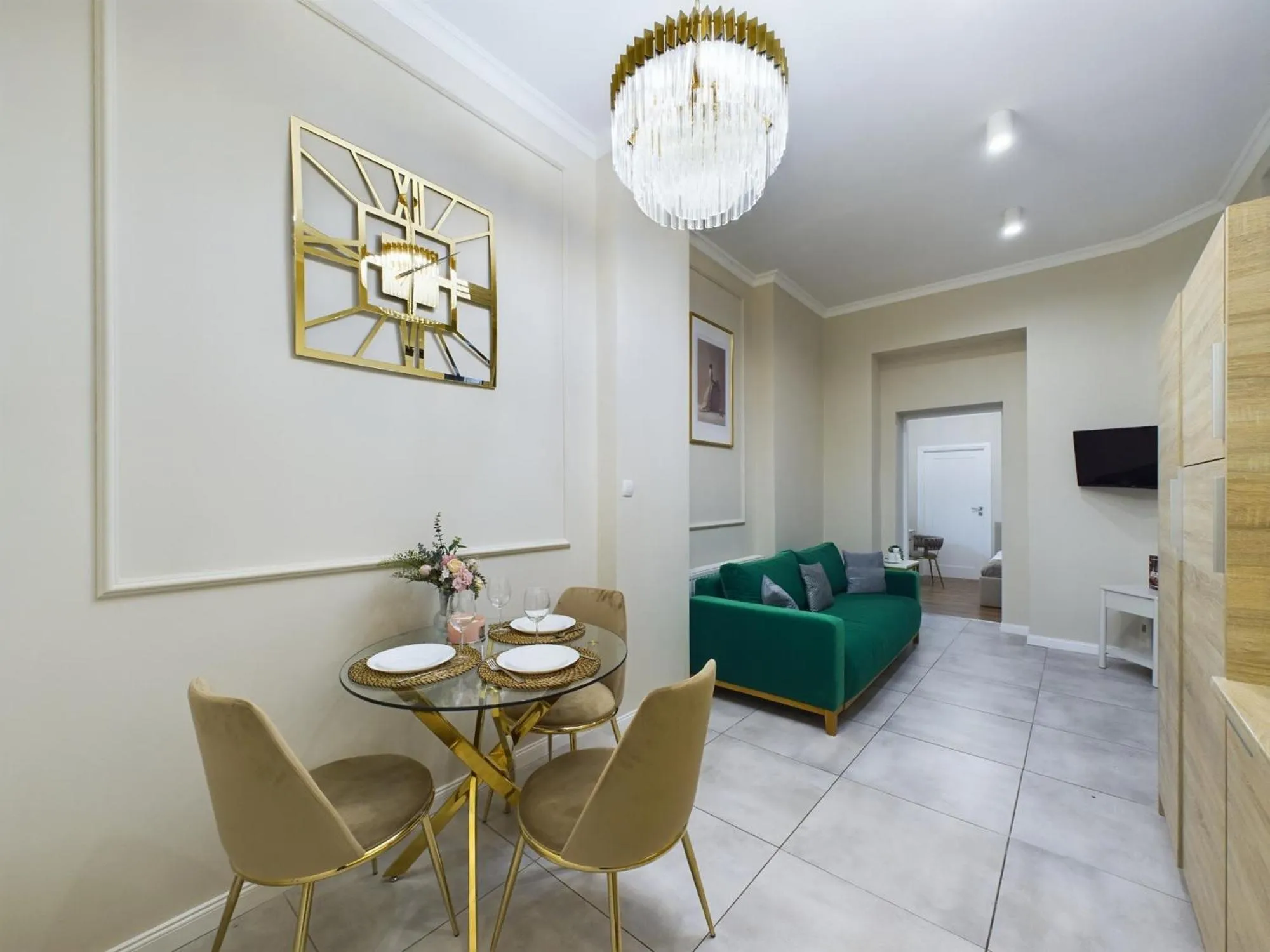 Communal lounge/ TV room in Apartments Dietla Cracow by Noclegi Renters