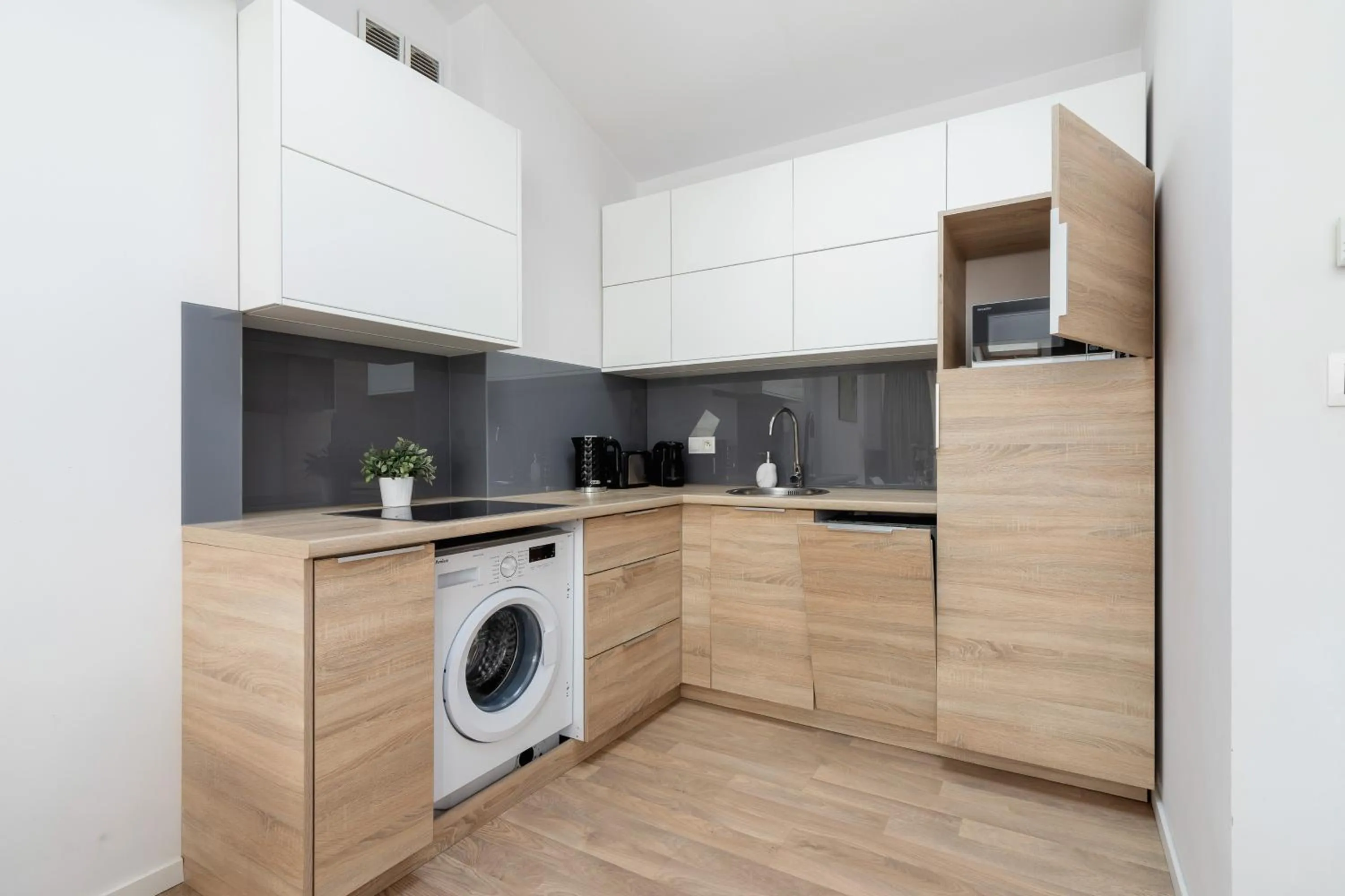 Kitchen or kitchenette in Apartments Dietla Cracow by Noclegi Renters