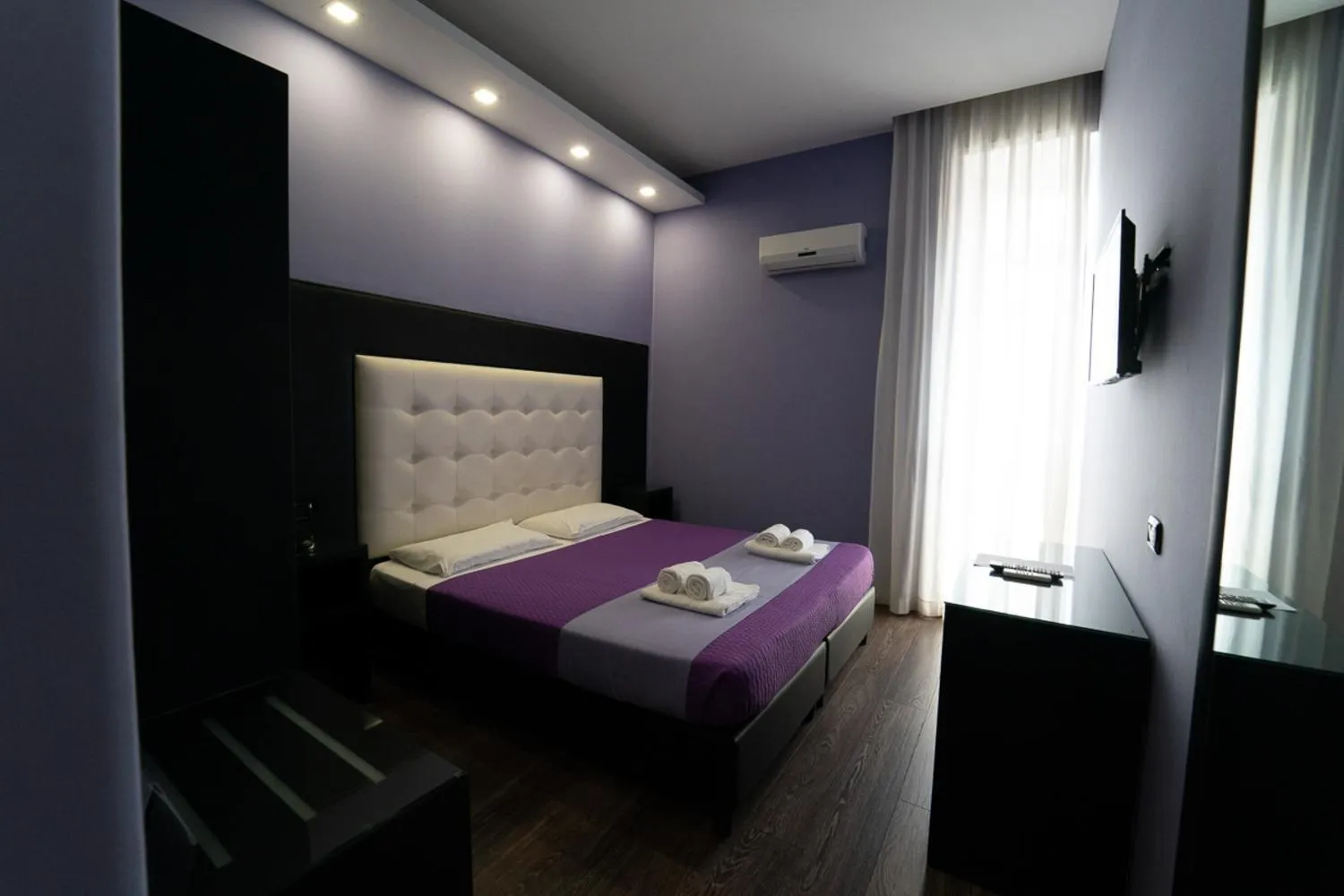 Bed in Sweet Central Hotel