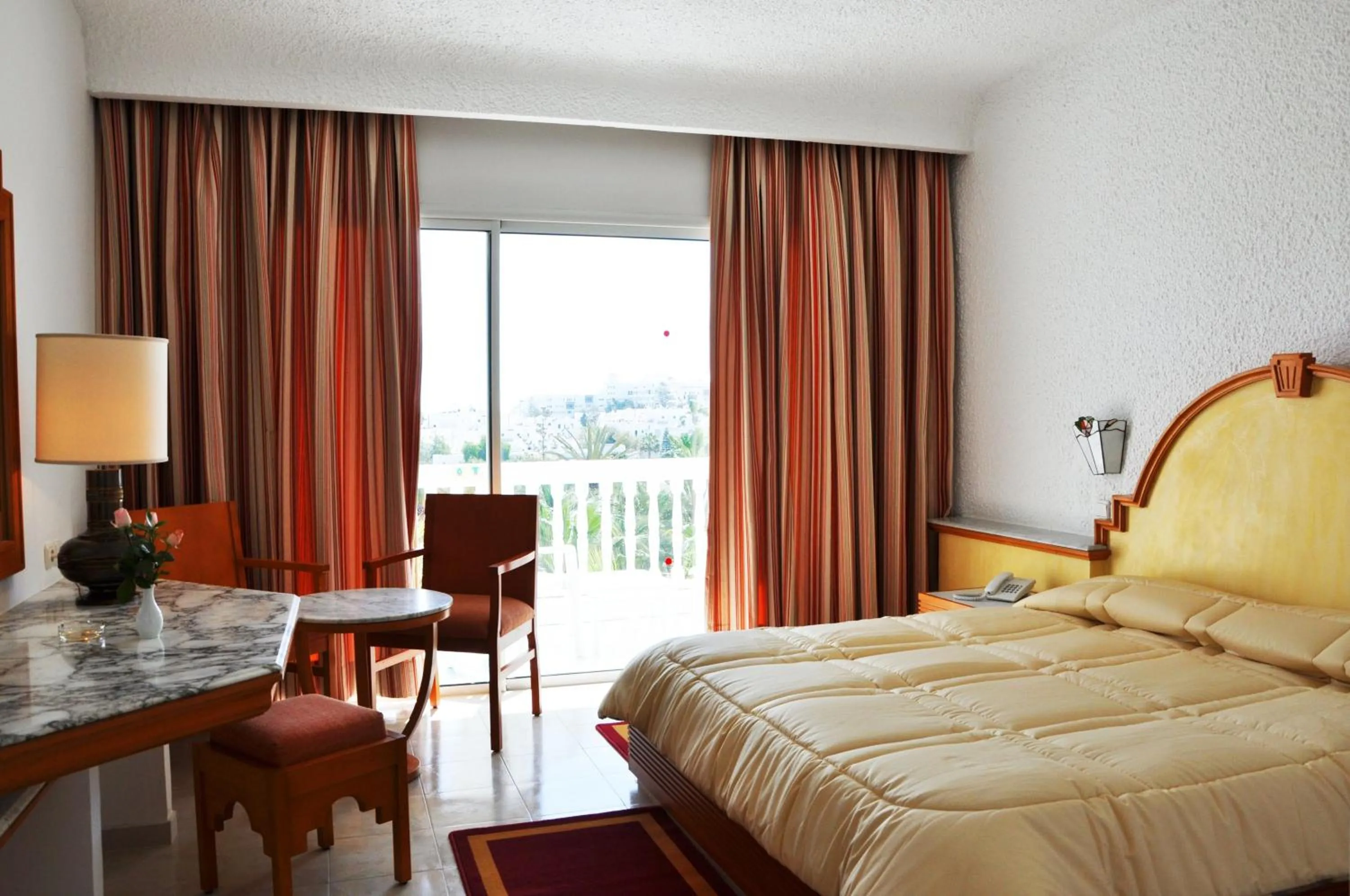 Bed in Kanta Resort and Spa