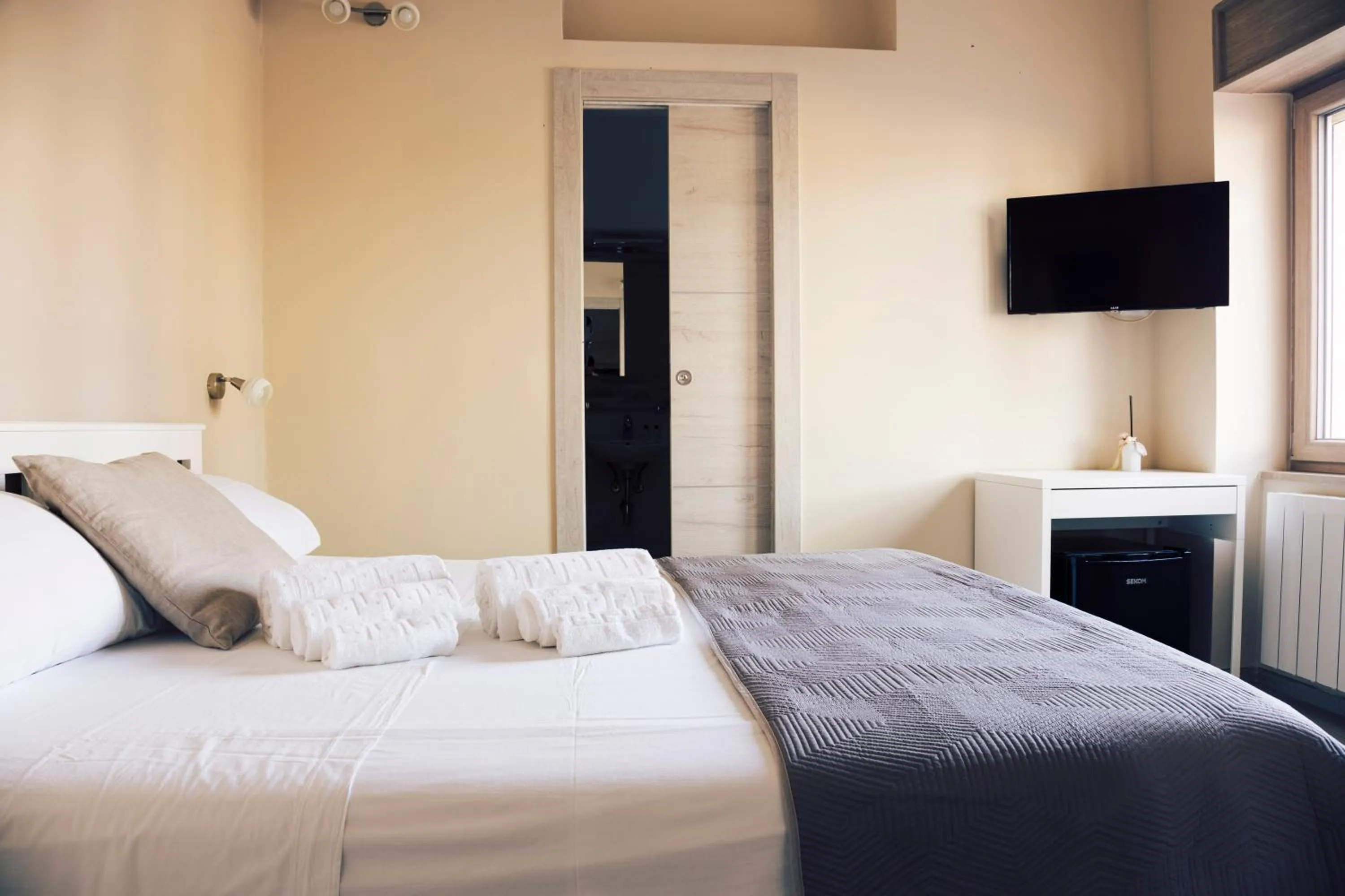 Bed in B&B NACALUI Gallipoli