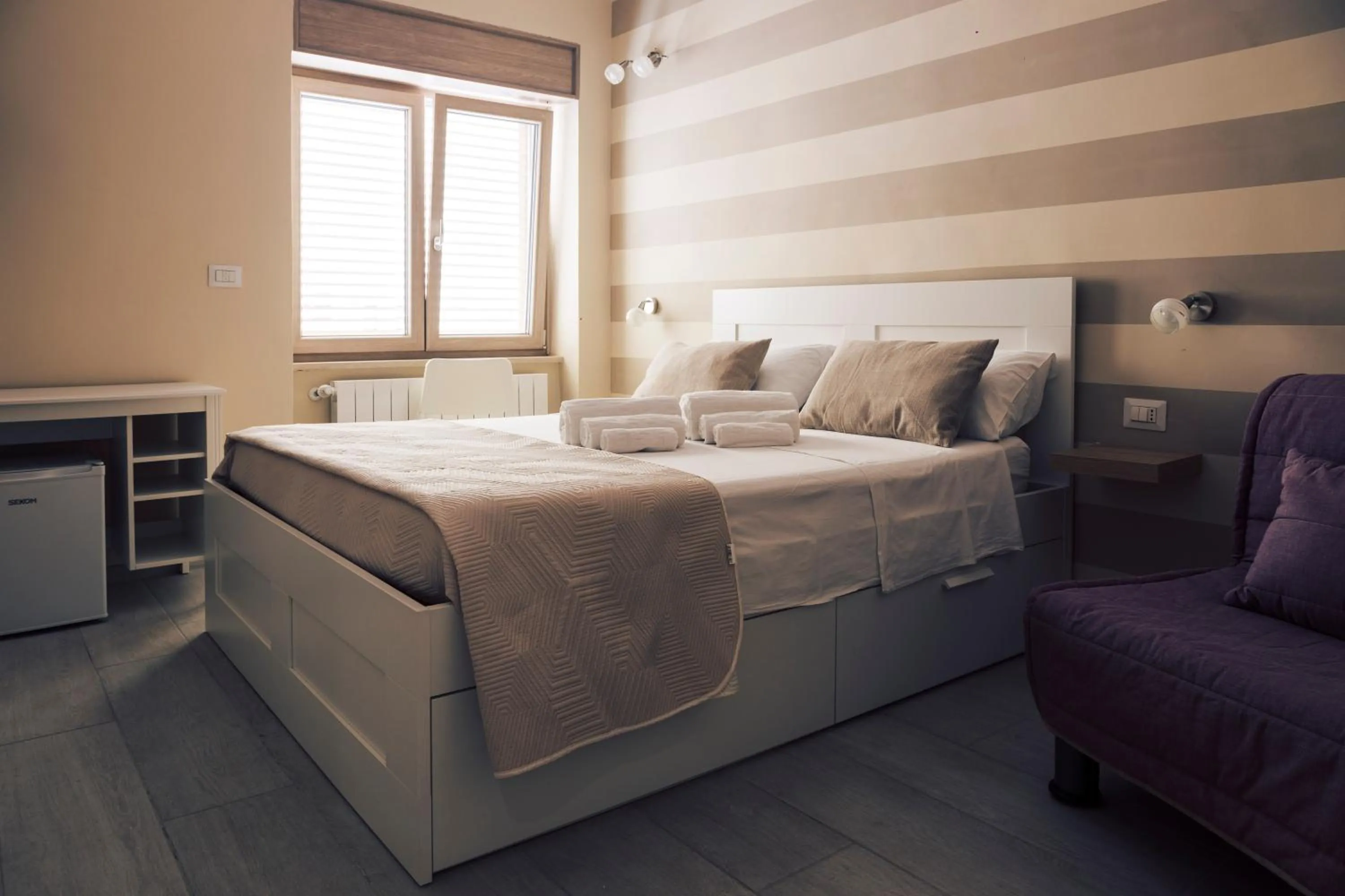 Bed in B&B NACALUI Gallipoli