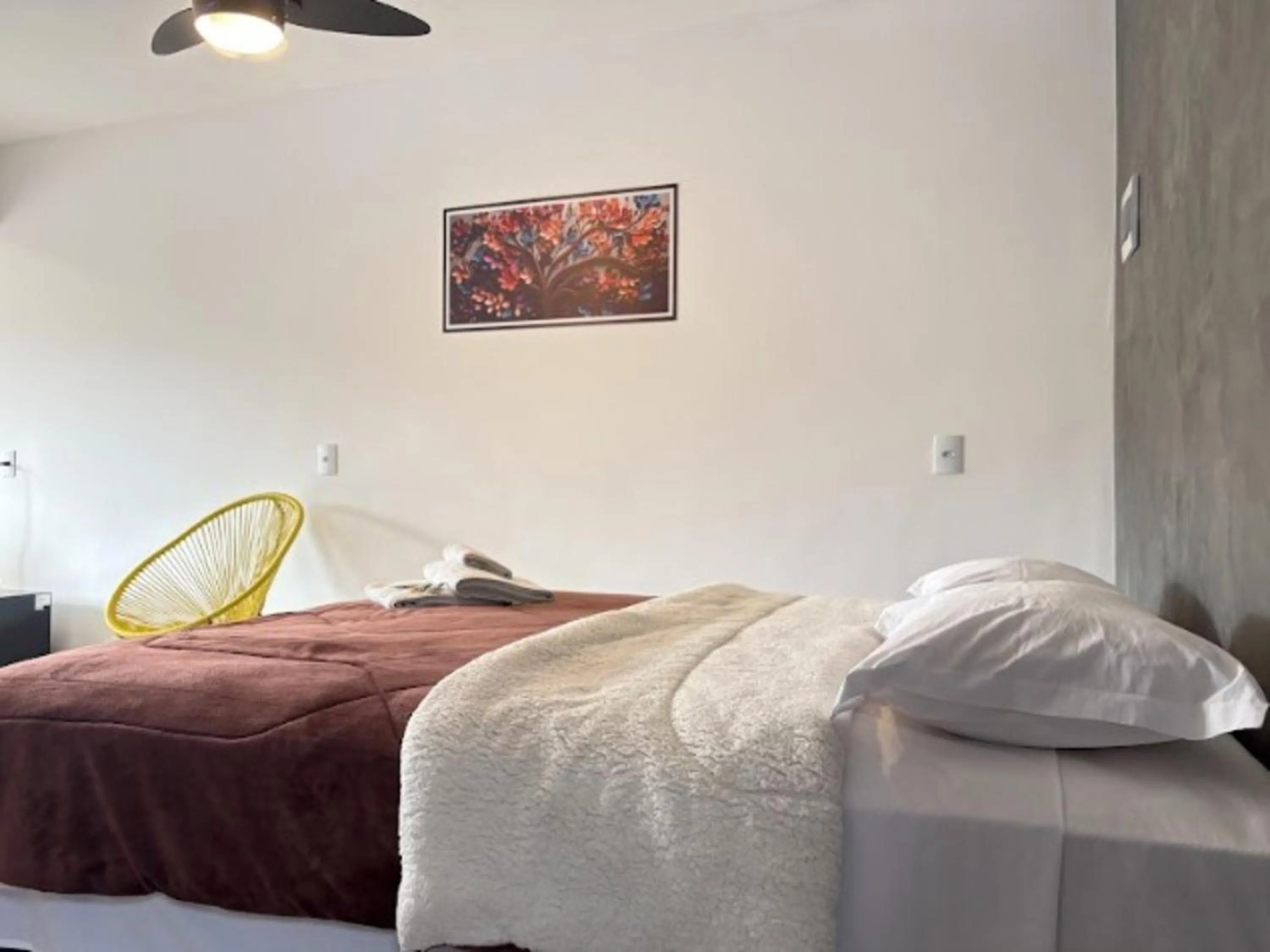 Bed in Pousada Recanto da Cascata