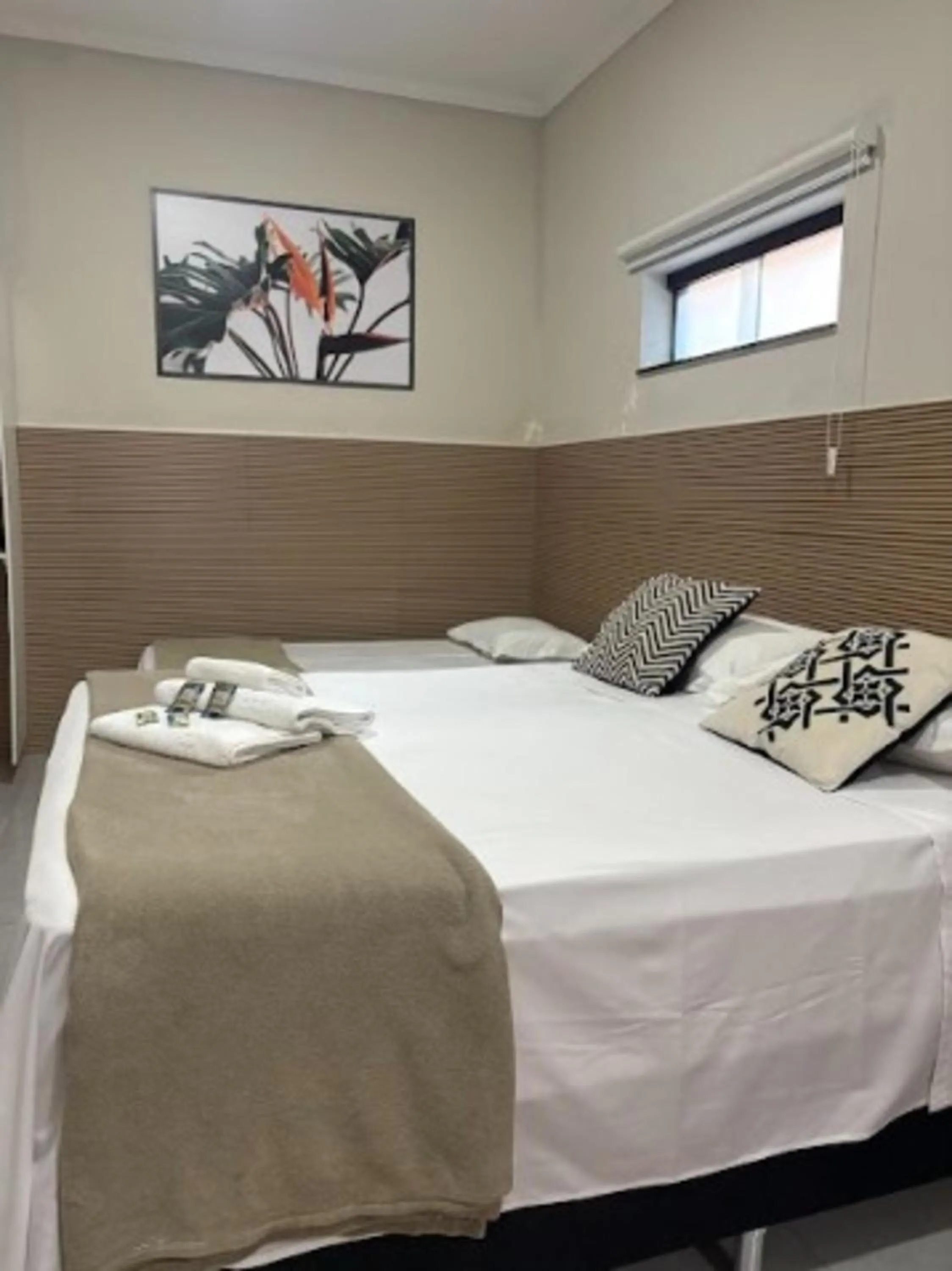 Bed in Pousada Recanto da Cascata