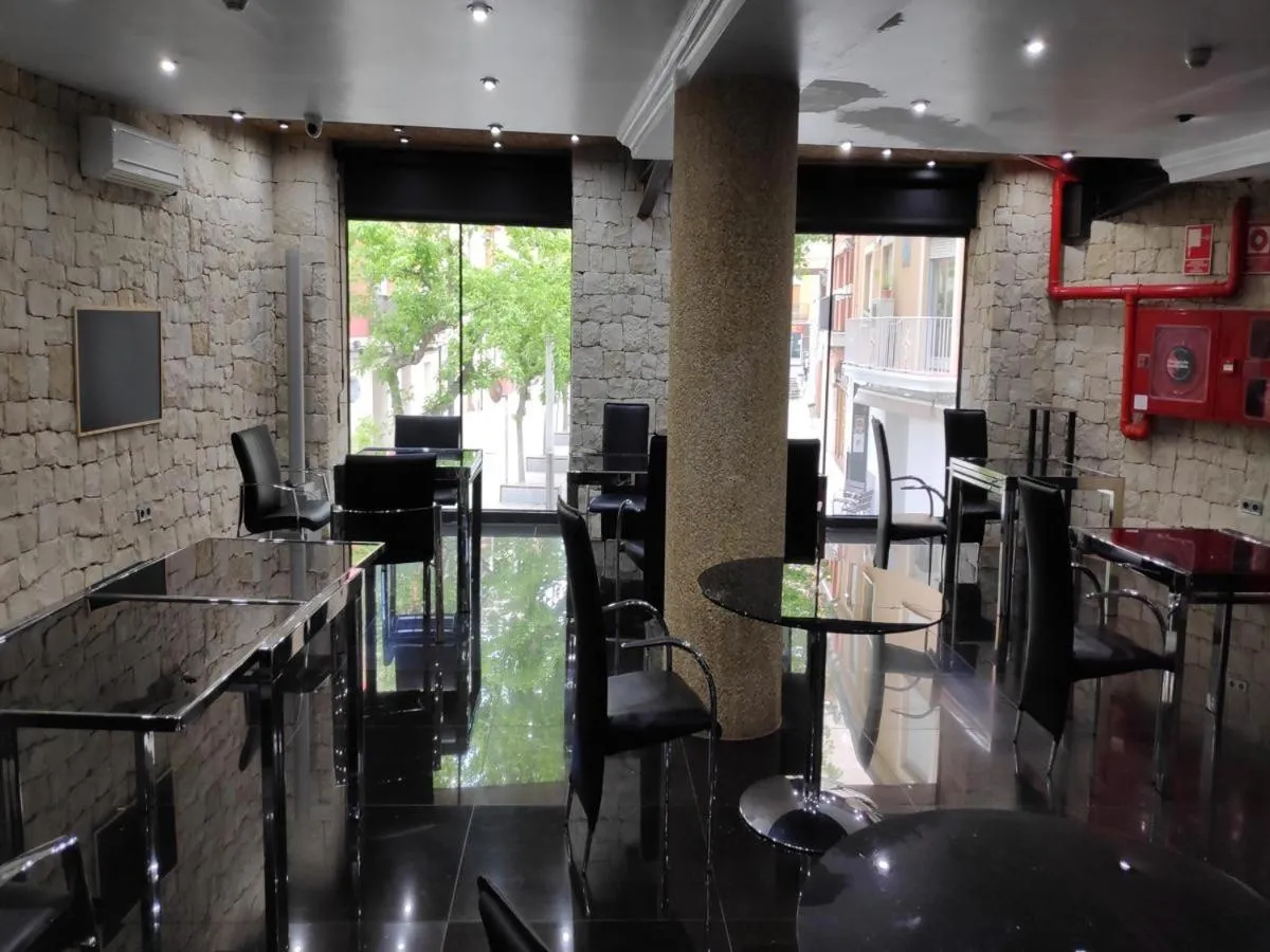 Communal lounge/ TV room in Hotel Plata