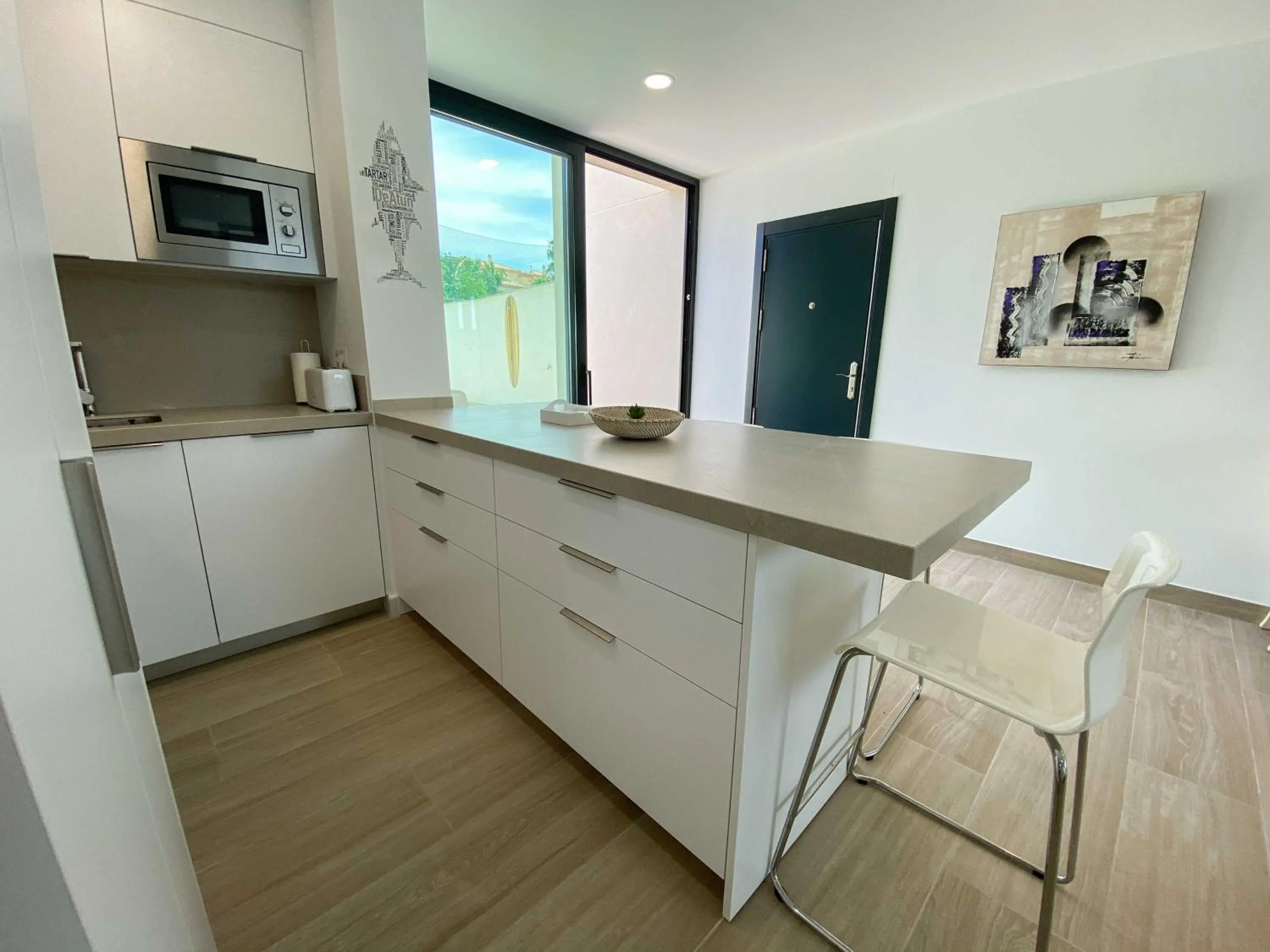 Kitchen or kitchenette in Tarifa Cozy House - Private Pool - Wifi - Modern