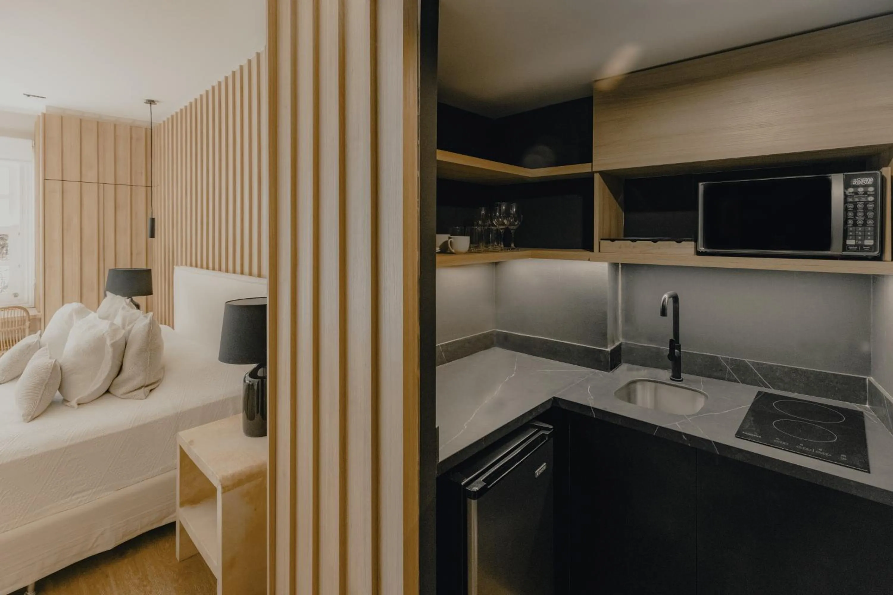 Kitchen or kitchenette, Bed in Le Bibló