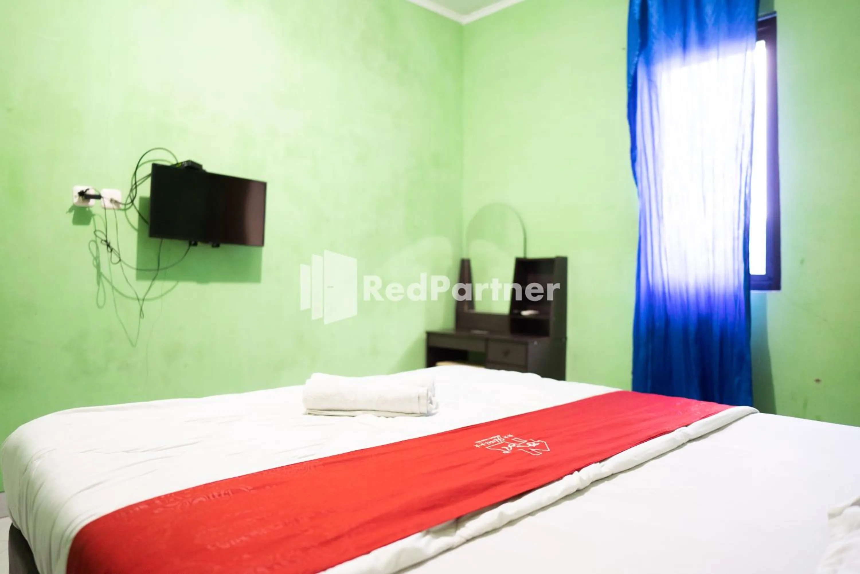 Bedroom in Hotel Ratu Ayu 2 Lampung Mitra RedDoorz