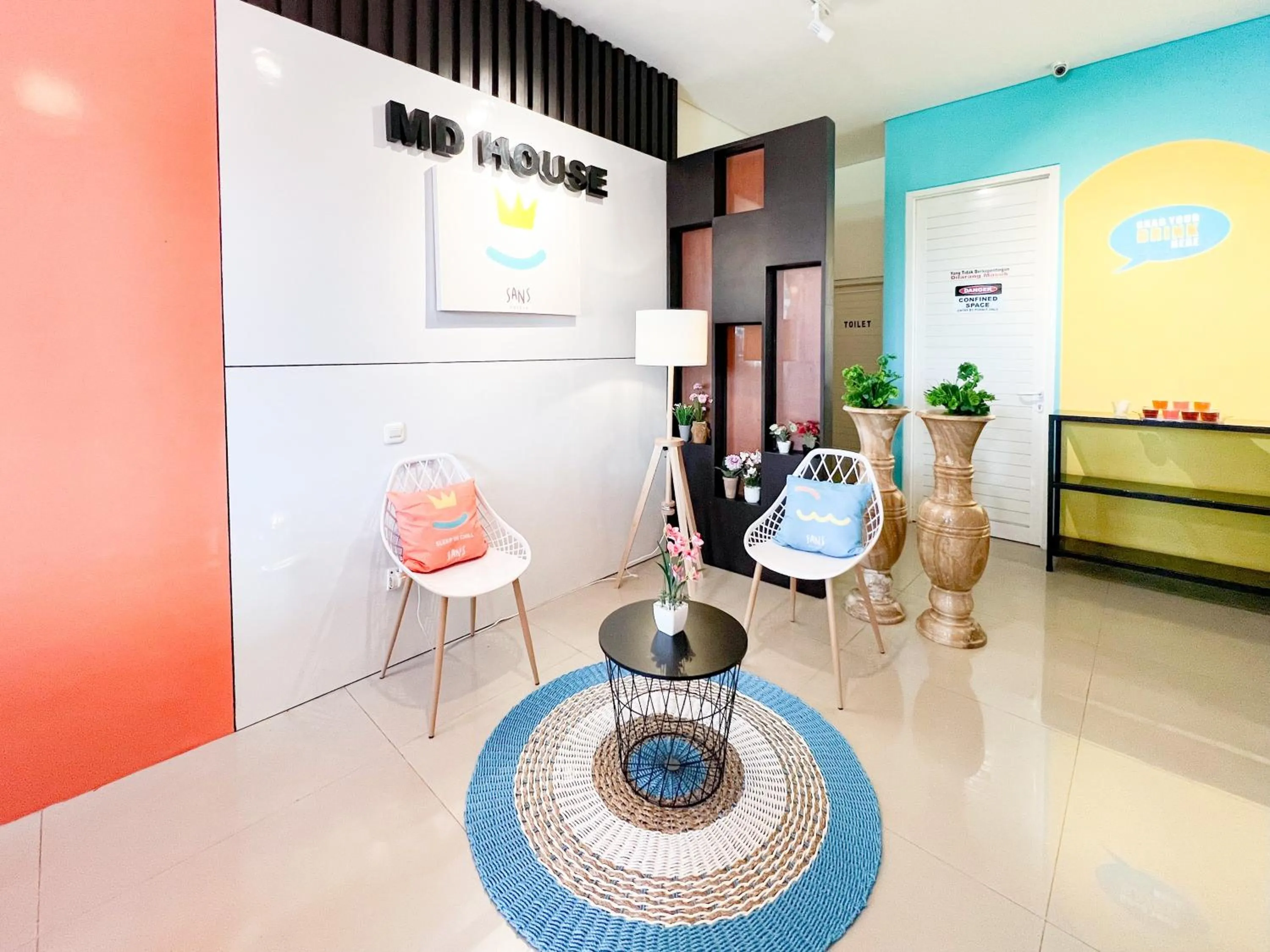 Seating area in Sans Stay Bukit Palma Citraland