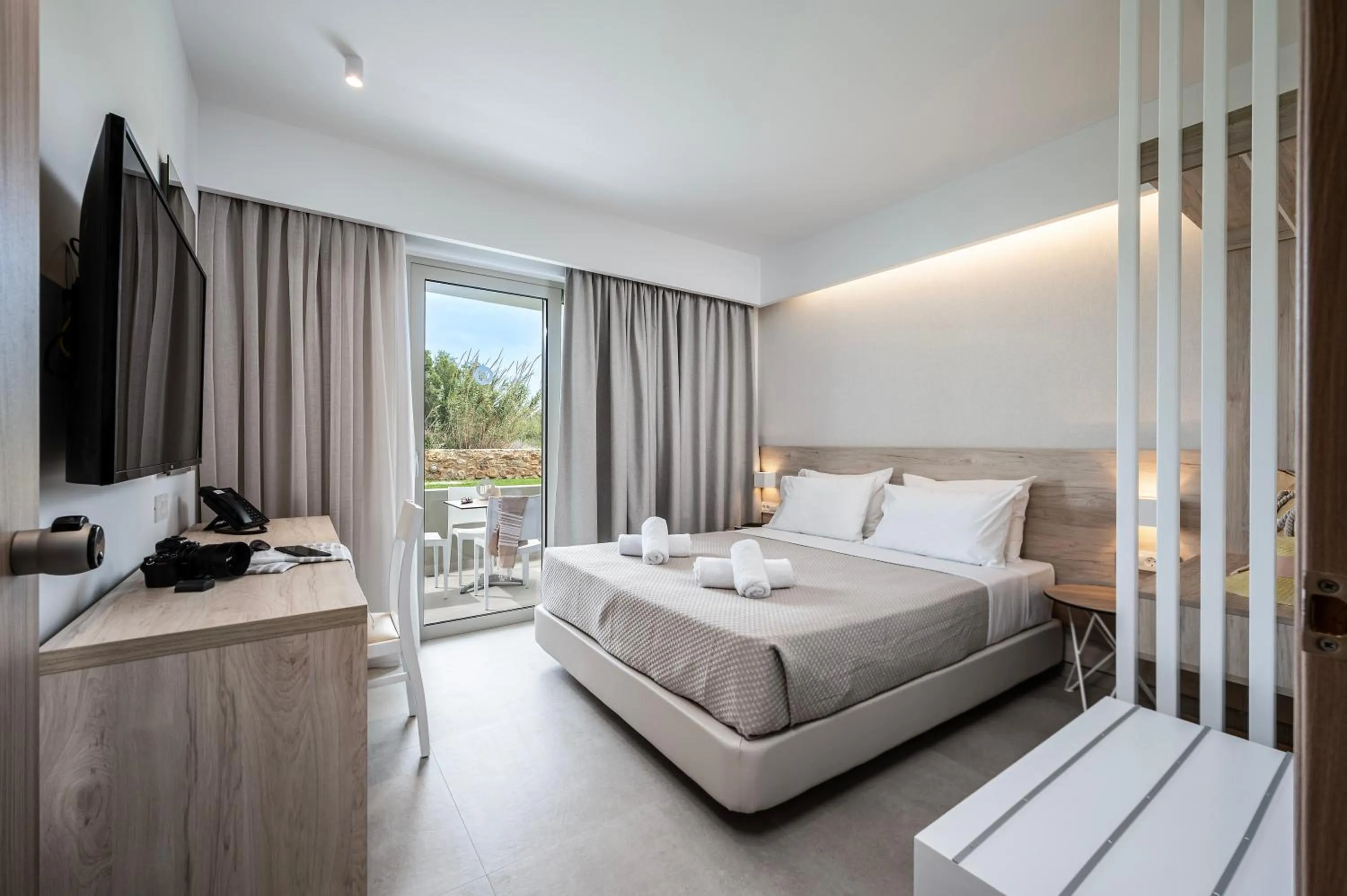 Photo of the whole room, Bed in Mythos Suites Hotel