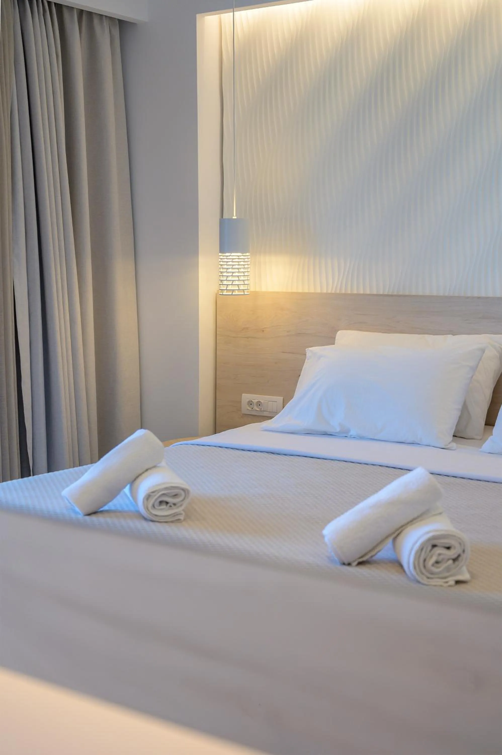 Bedroom, Bed in Mythos Suites Hotel